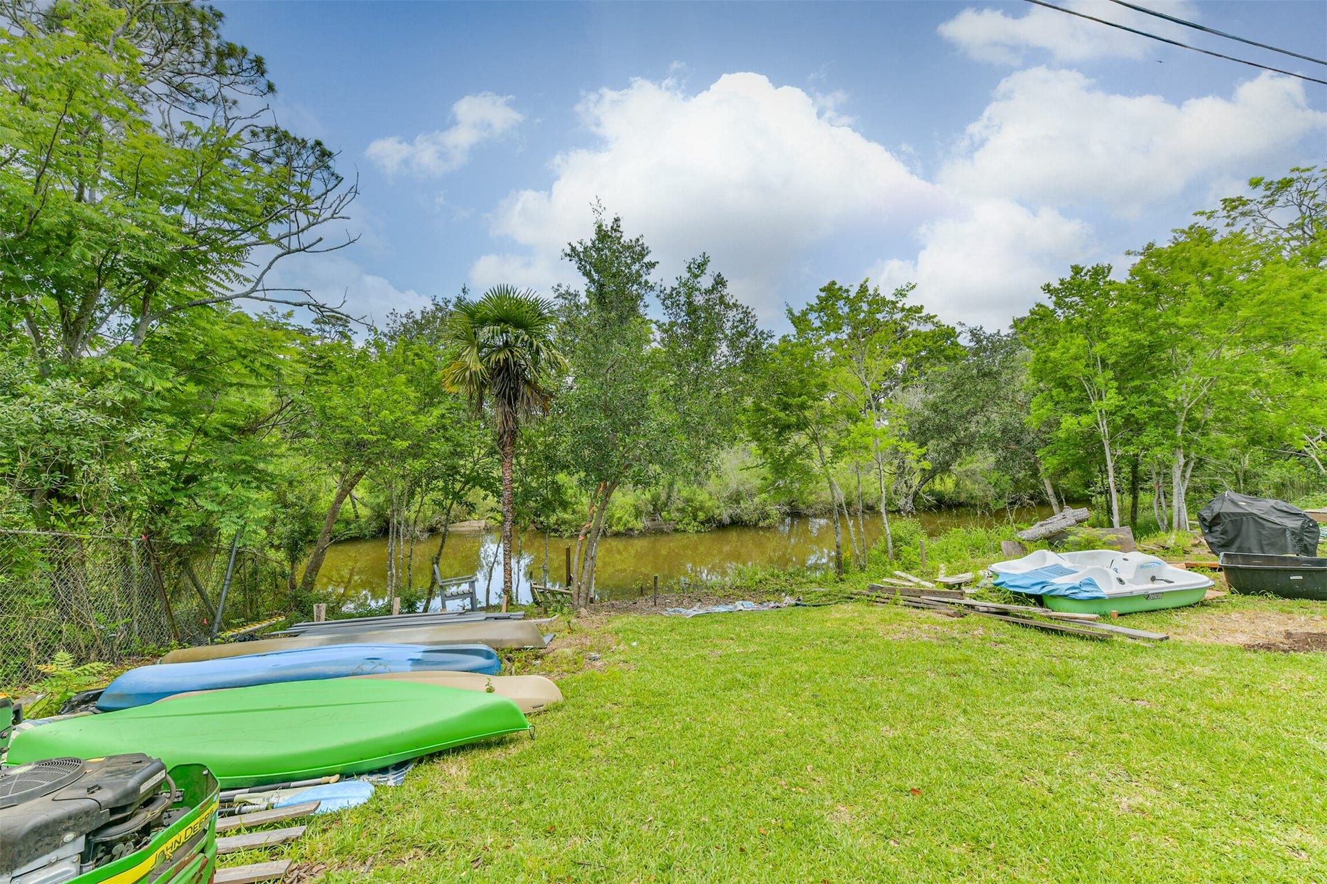 207 Oakridge Drive, Hitchcock, TX 77563 Highland Bayou feeder; get ready to go fishing.