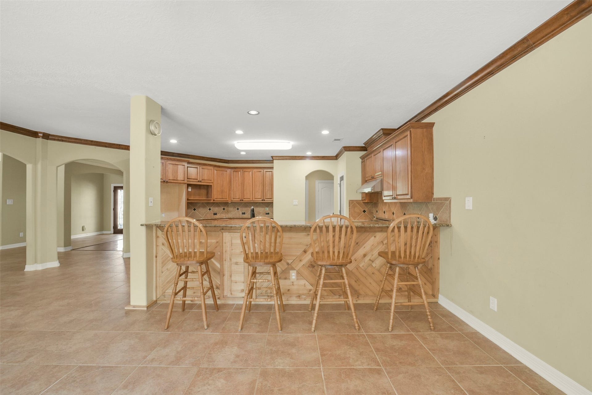 3522 Wellspring Lake Drive, Fulshear, TX 77441 Custom Wood Designed Paneled Breakfast Bar! Plenty of room for the whole family!
