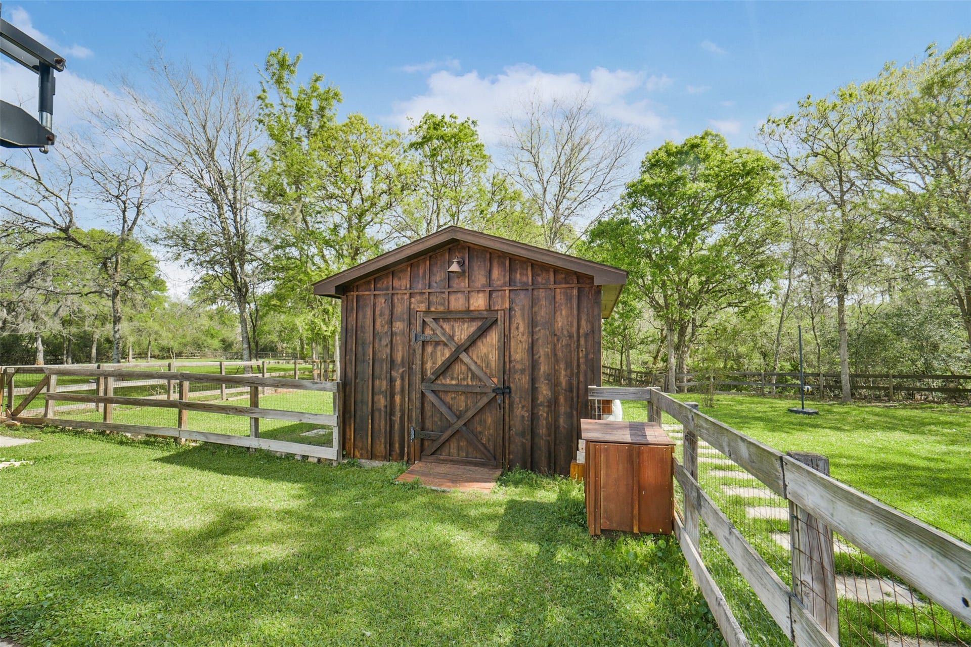 3522 Wellspring Lake Drive, Fulshear, TX 77441 Amazing Custom Shed with Areas for Storage, along with it housing your own private well that serves as an irrigation system for the back half of the yard!