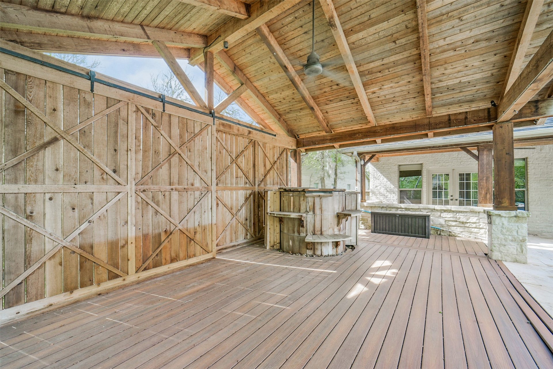 3522 Wellspring Lake Drive, Fulshear, TX 77441 Welcome to your own Private Pavilion that looks onto your Amazing Ozark Mountain Style Hot tub!!! Surrounded buy wooden deck....A True Mountain Oasis right in your own back Yard!