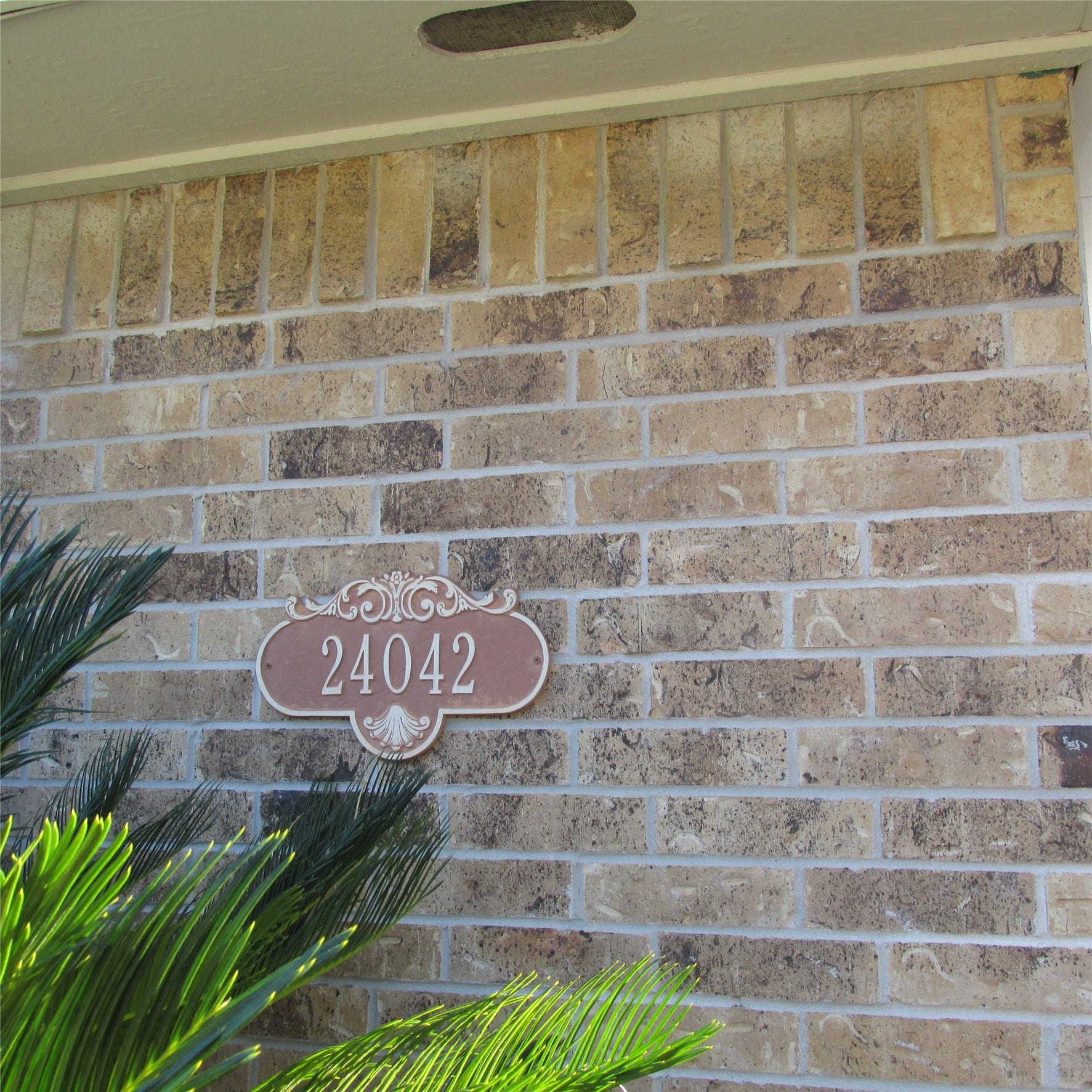 24042 Spring Gum Drive, Spring, TX 77373 Brick Wall