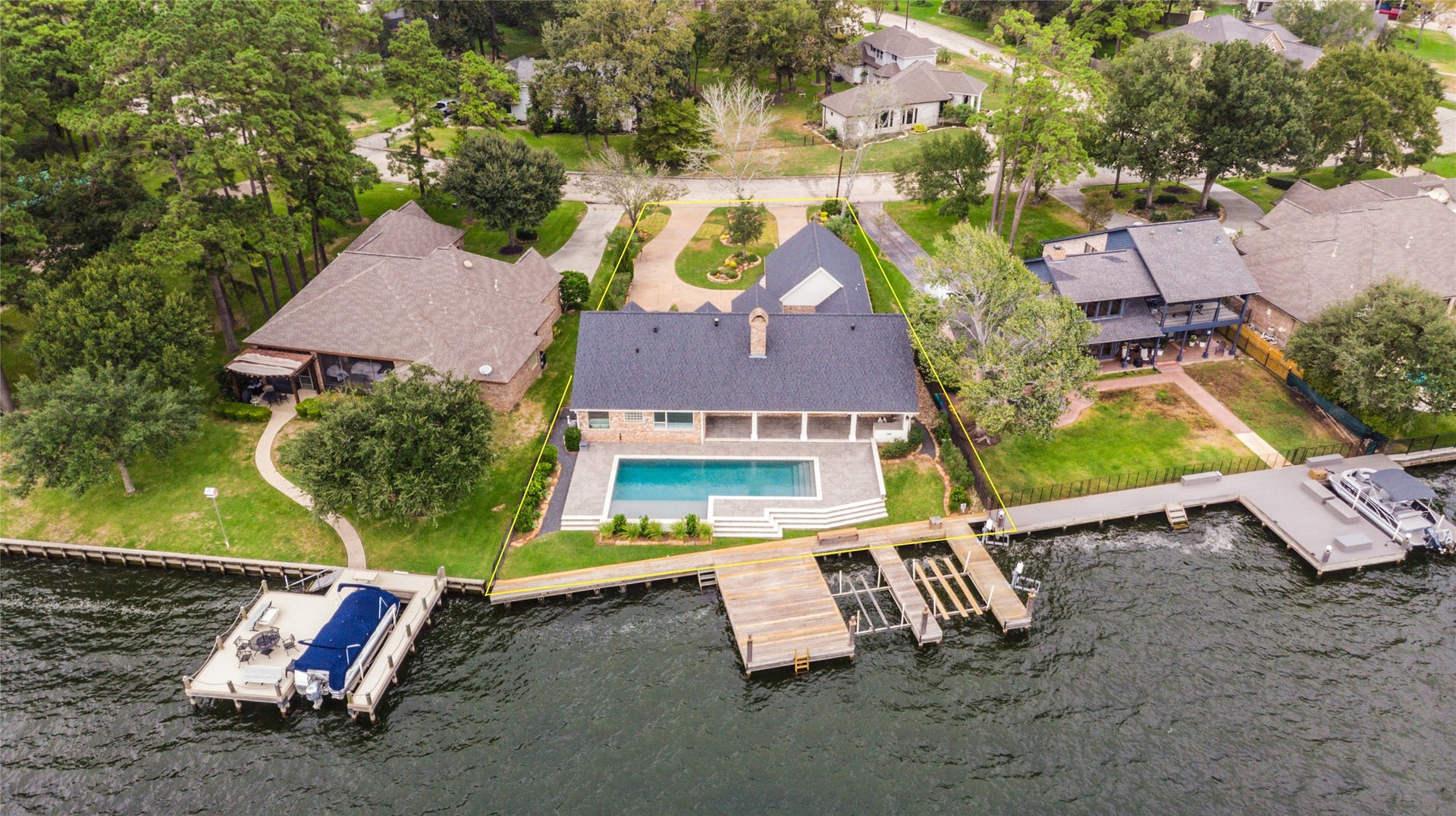 12092 Sagittarius Drive E, Willis, TX 77318 Space for all your boating needs. deck will accommodate two boats and two jet skis. Extra-large deck 19 X 30.