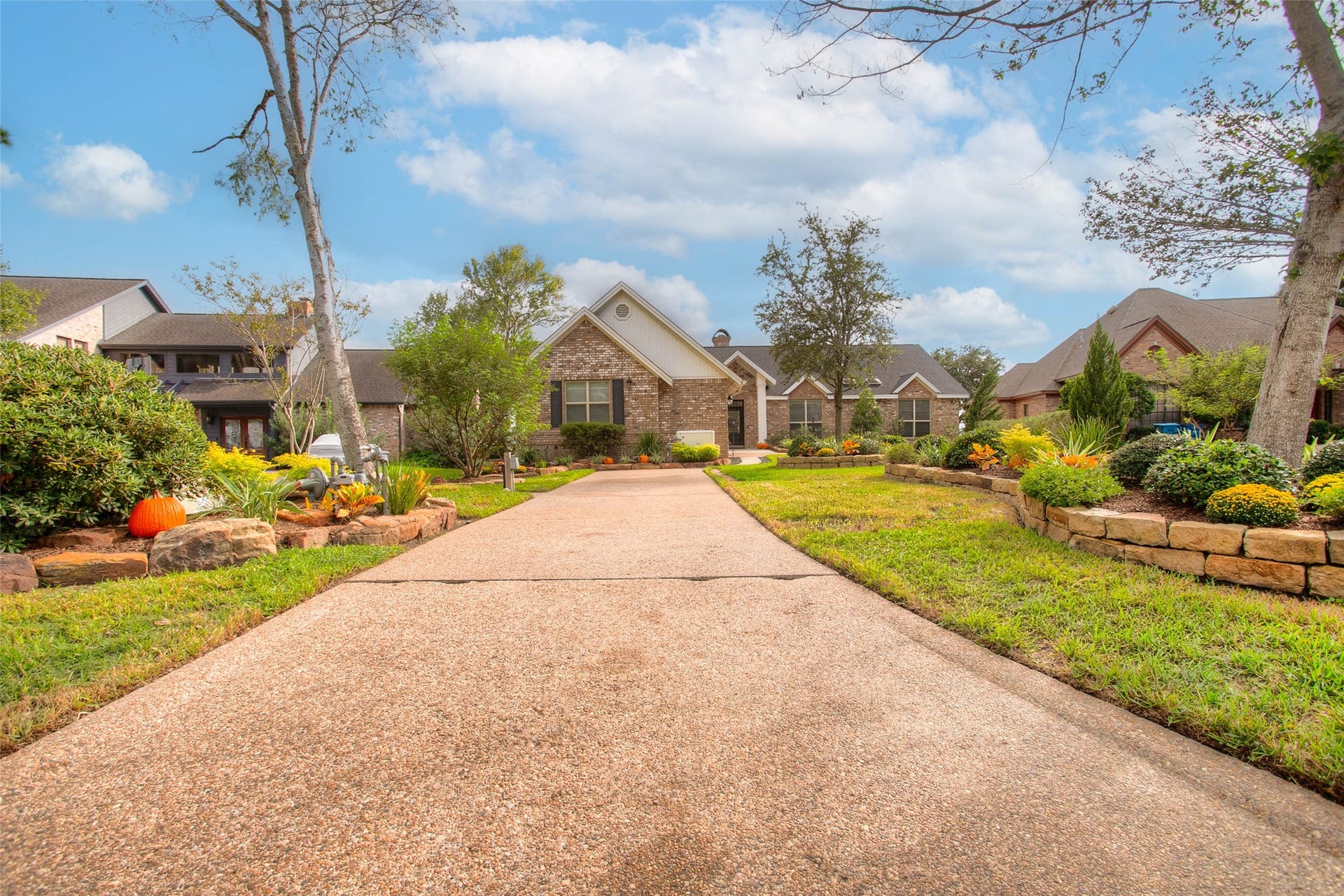 12092 Sagittarius Drive E, Willis, TX 77318 2nd driveway perfect for RV parking, enhancing convenience and flexibility for your adventurous lifestyle. 50 Amp full service/ hook-up.