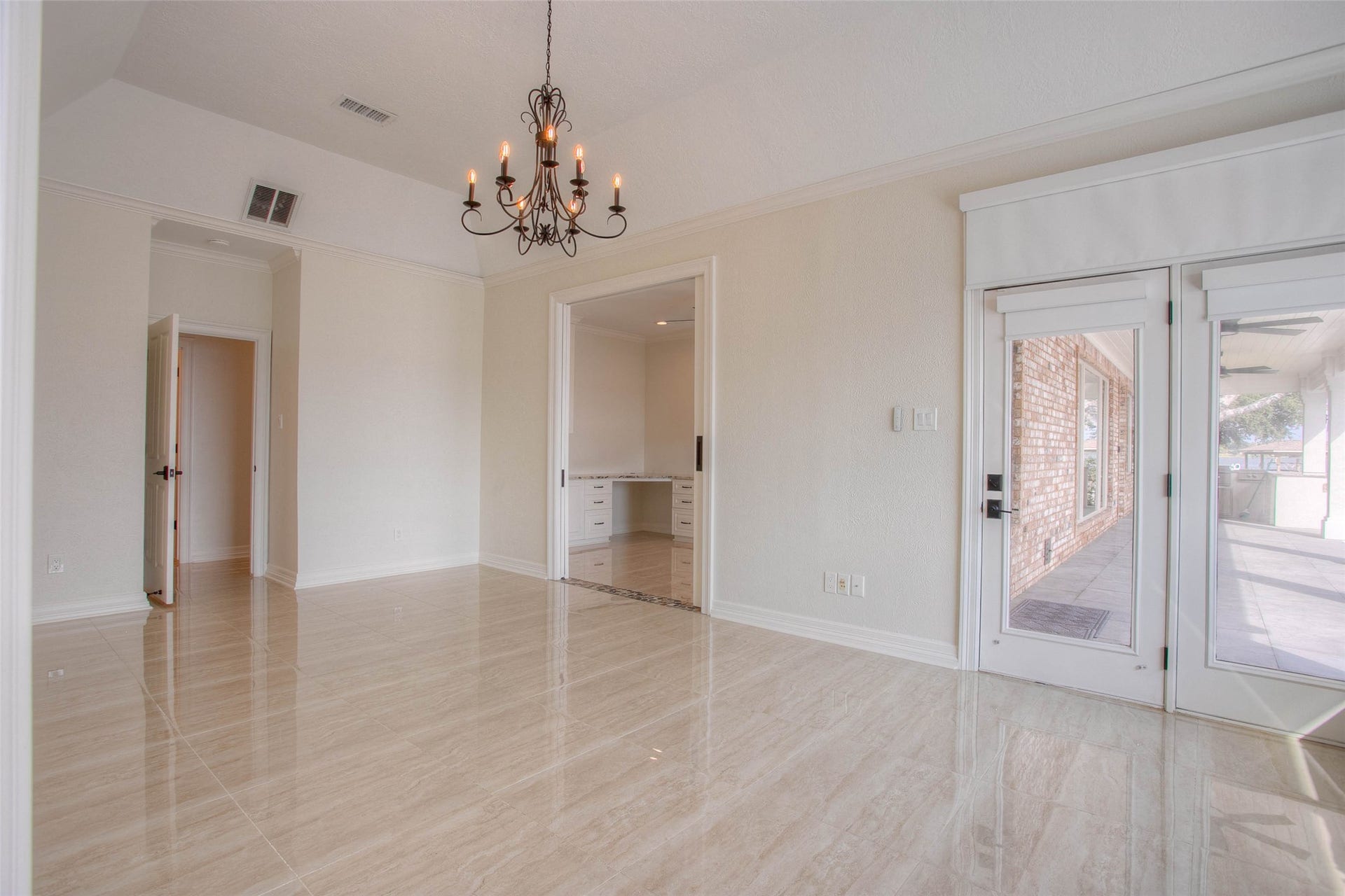 12092 Sagittarius Drive E, Willis, TX 77318 Primary bedroom leads to outdoor pool area