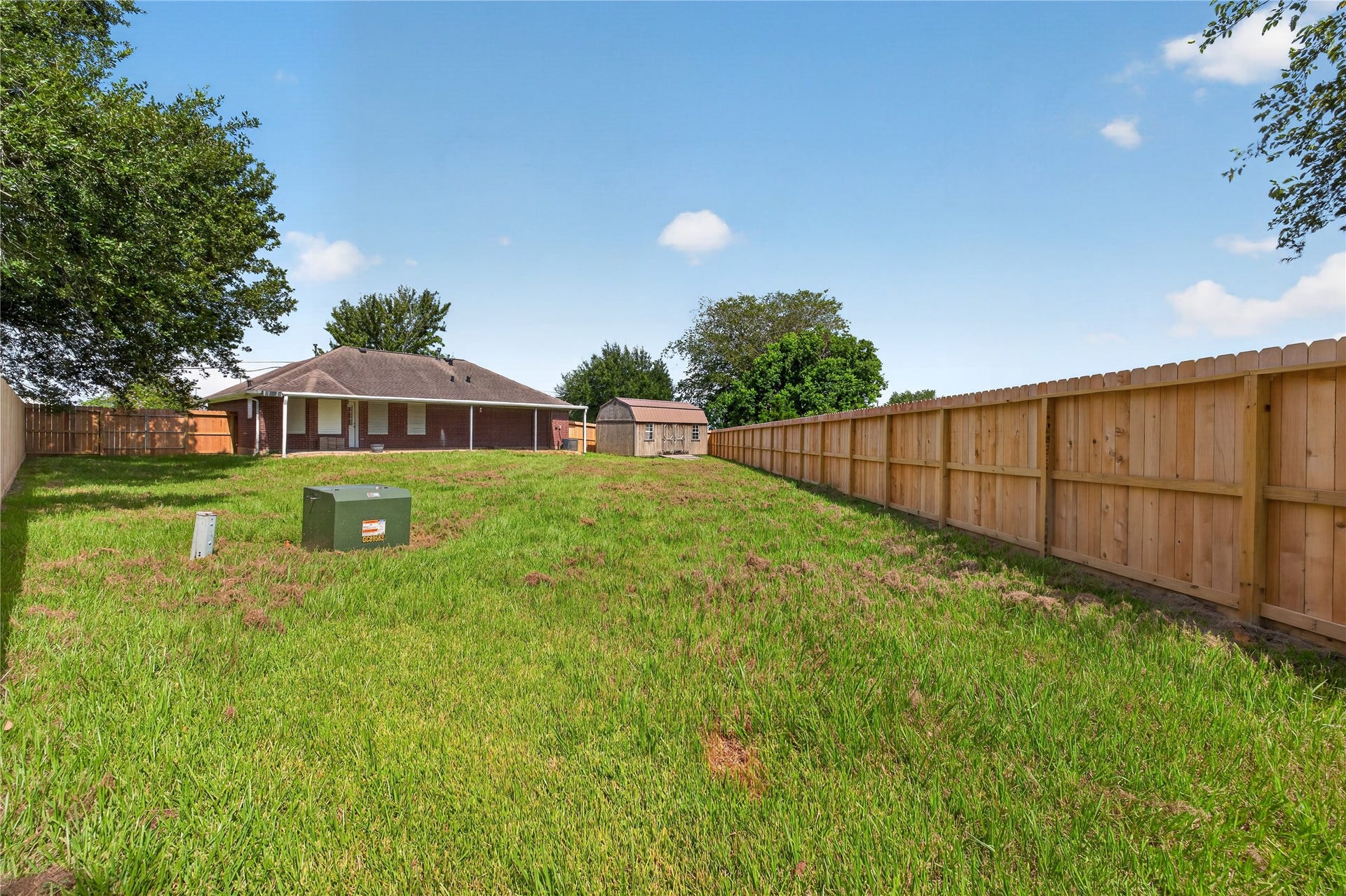 3413 Owens Drive, Dickinson, TX 77539 Backyard with privacy fence
