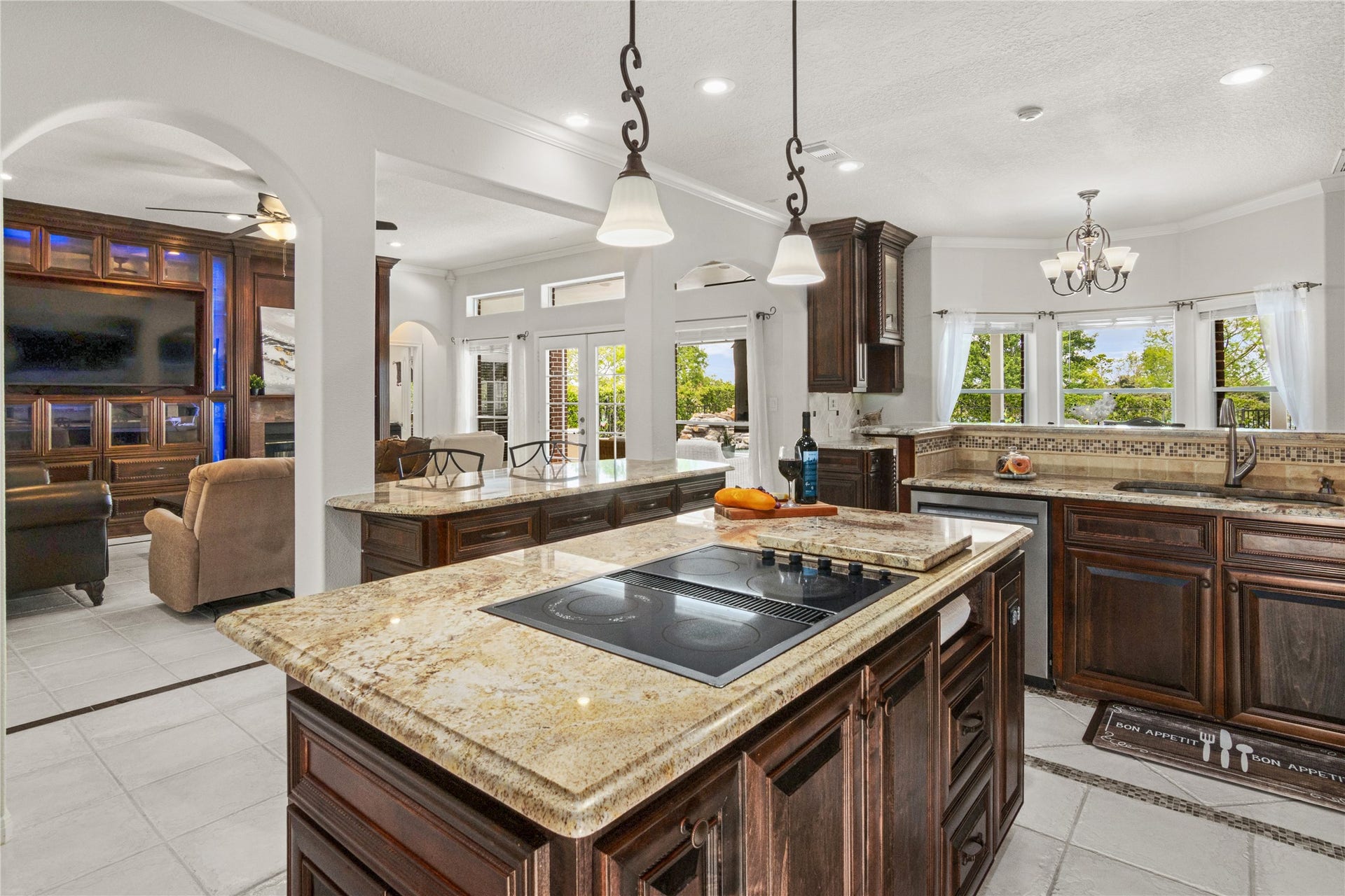 143 Lago Circle Drive N, Santa Fe, TX 77517 Large island with cooktop great for entertaining