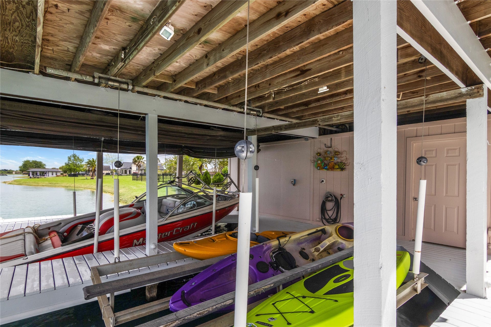 143 Lago Circle Drive N, Santa Fe, TX 77517 Boathouse for storage