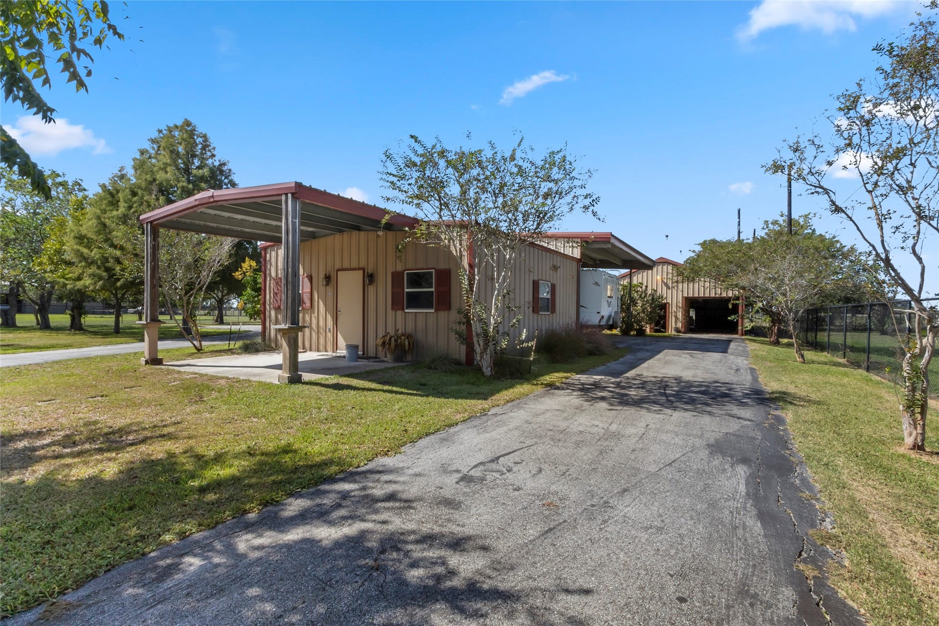 4114 Horseshoe Drive, Pleak, TX 77461 Workshop with two roll up doors and electricity.