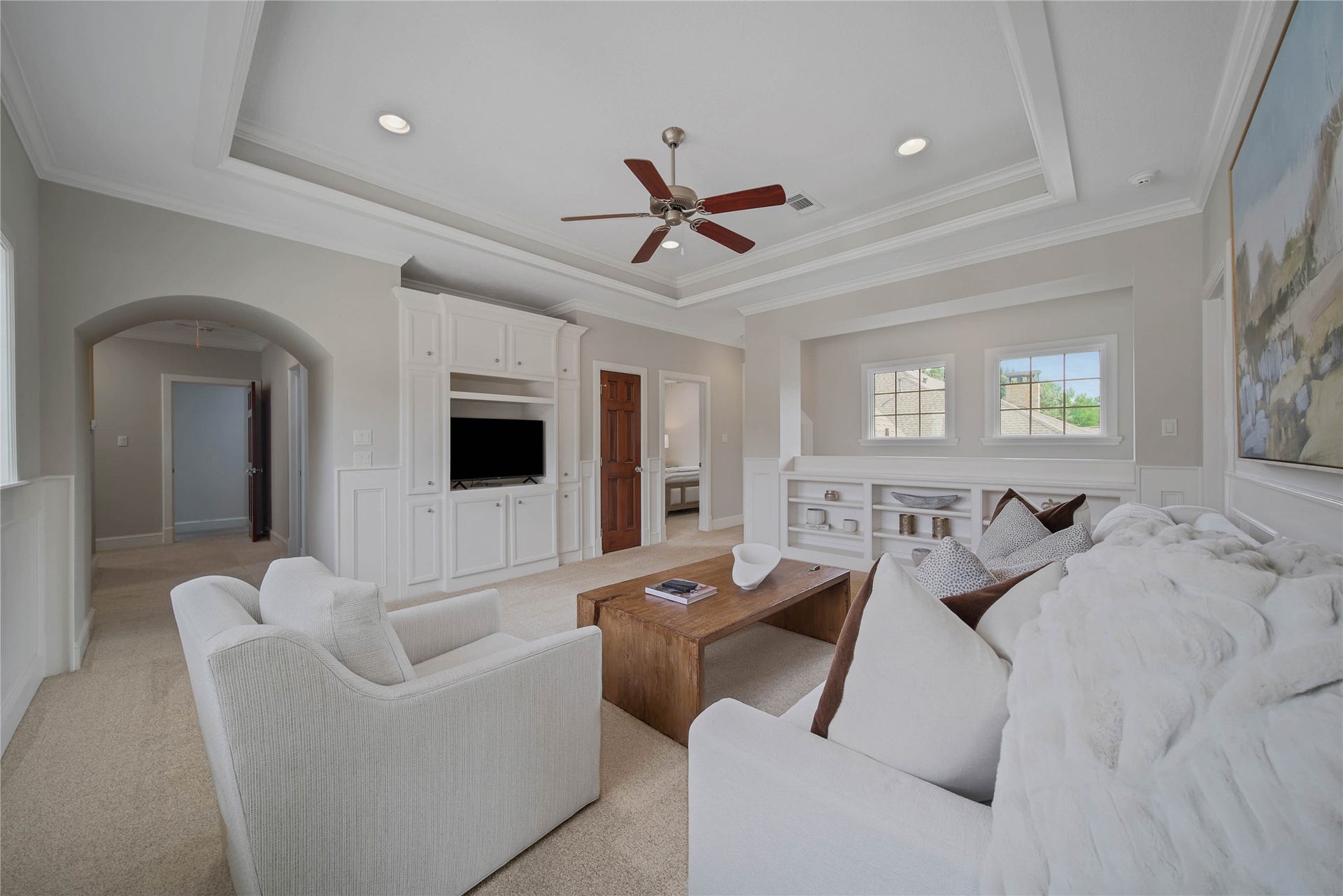 12635 Hunters Canyon Lane, Cypress, TX 77429 The back stair case leads to this flex space upstairs and features a coffered ceiling, built-in entertainment center, and cozy seating area, perfect for relaxation and gatherings. Plenty of room for a pool table!