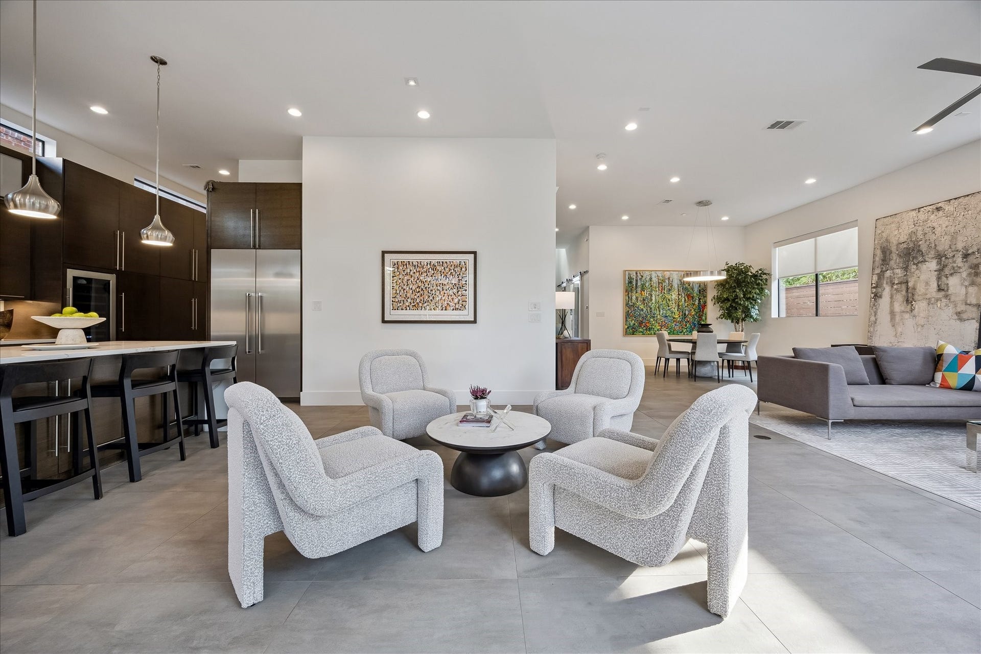 Stylish open-concept entertainment area with inviting conversation spaces.