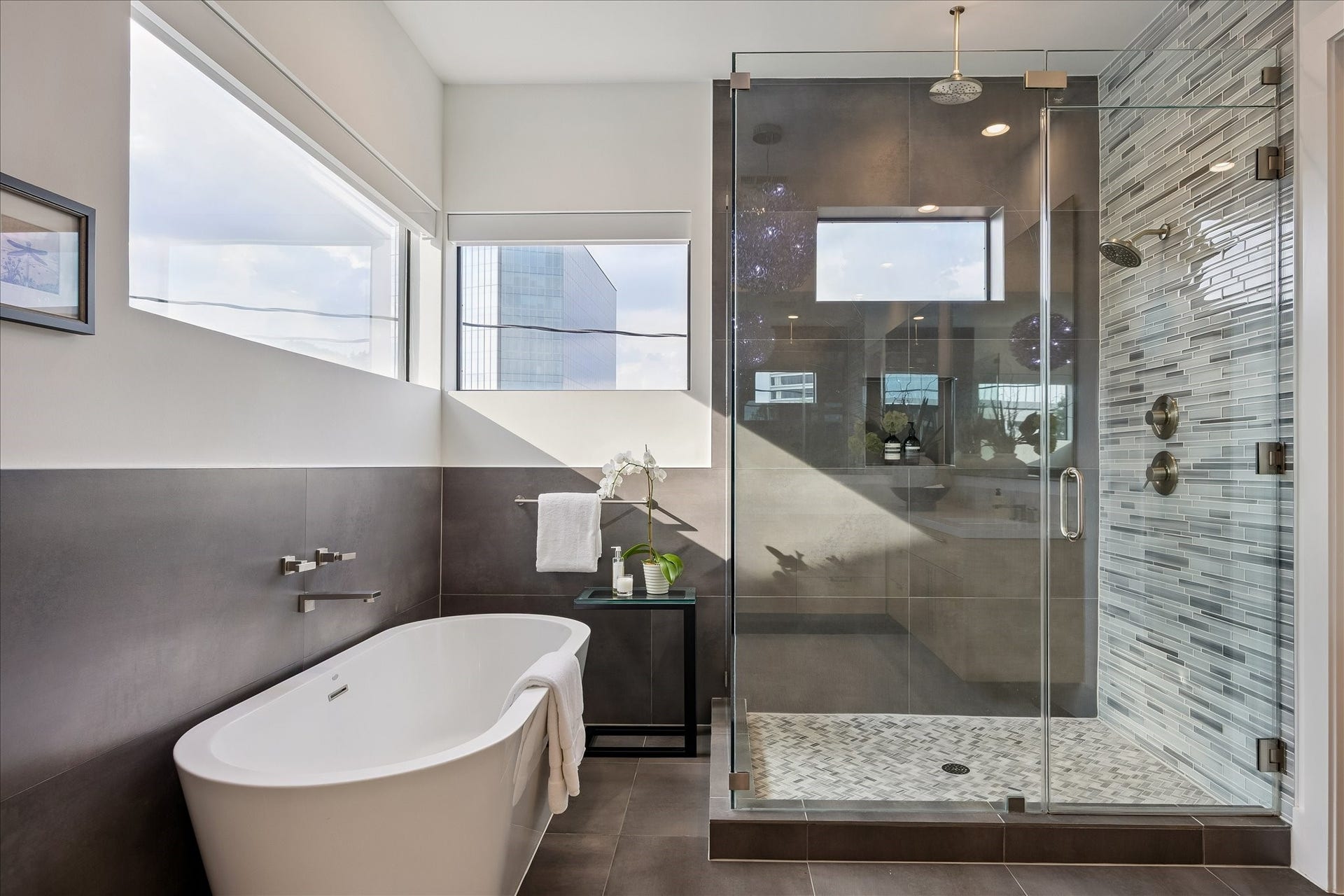 Choose between a quick refresh in the stand-up shower or a soothing soak in the elegant tub.