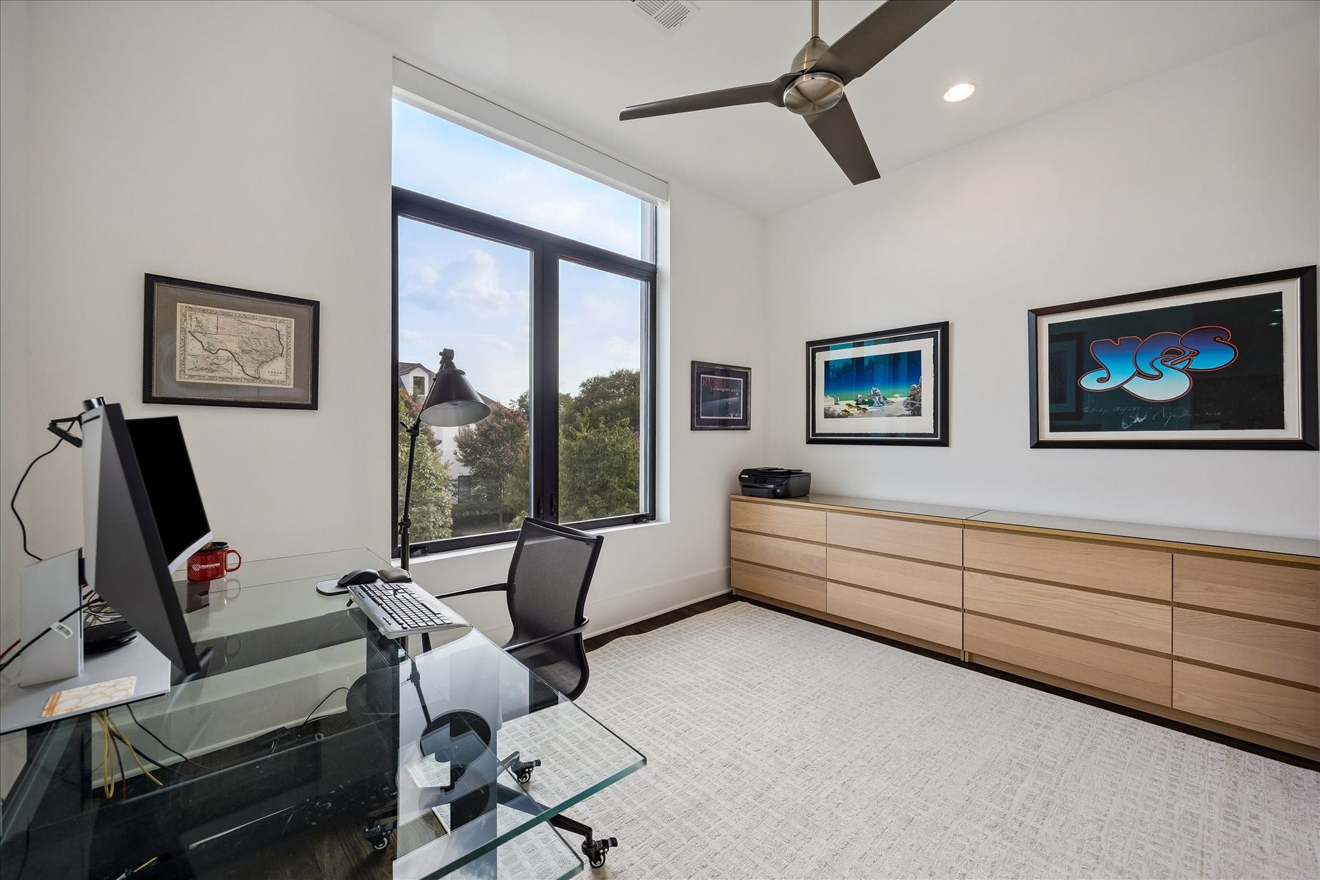 Spacious fourth bedroom with ensuite bath and walk-in closet, ideal for an office or guest retreat.