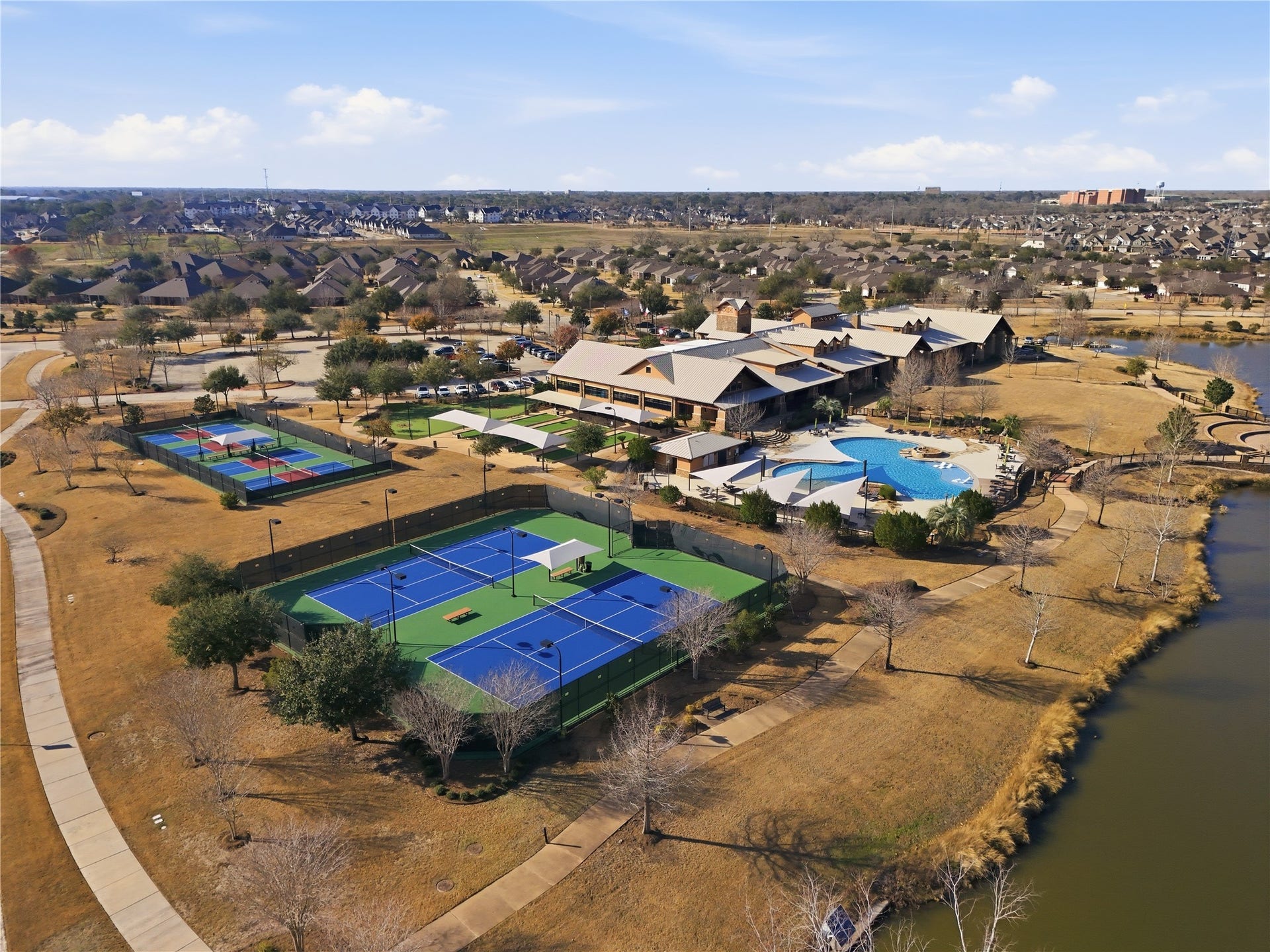 3263 Persimmon Grove, Richmond, TX 77469 recreation center has lots of amenities and events. Pickleball, tennis, swimming and much more!
