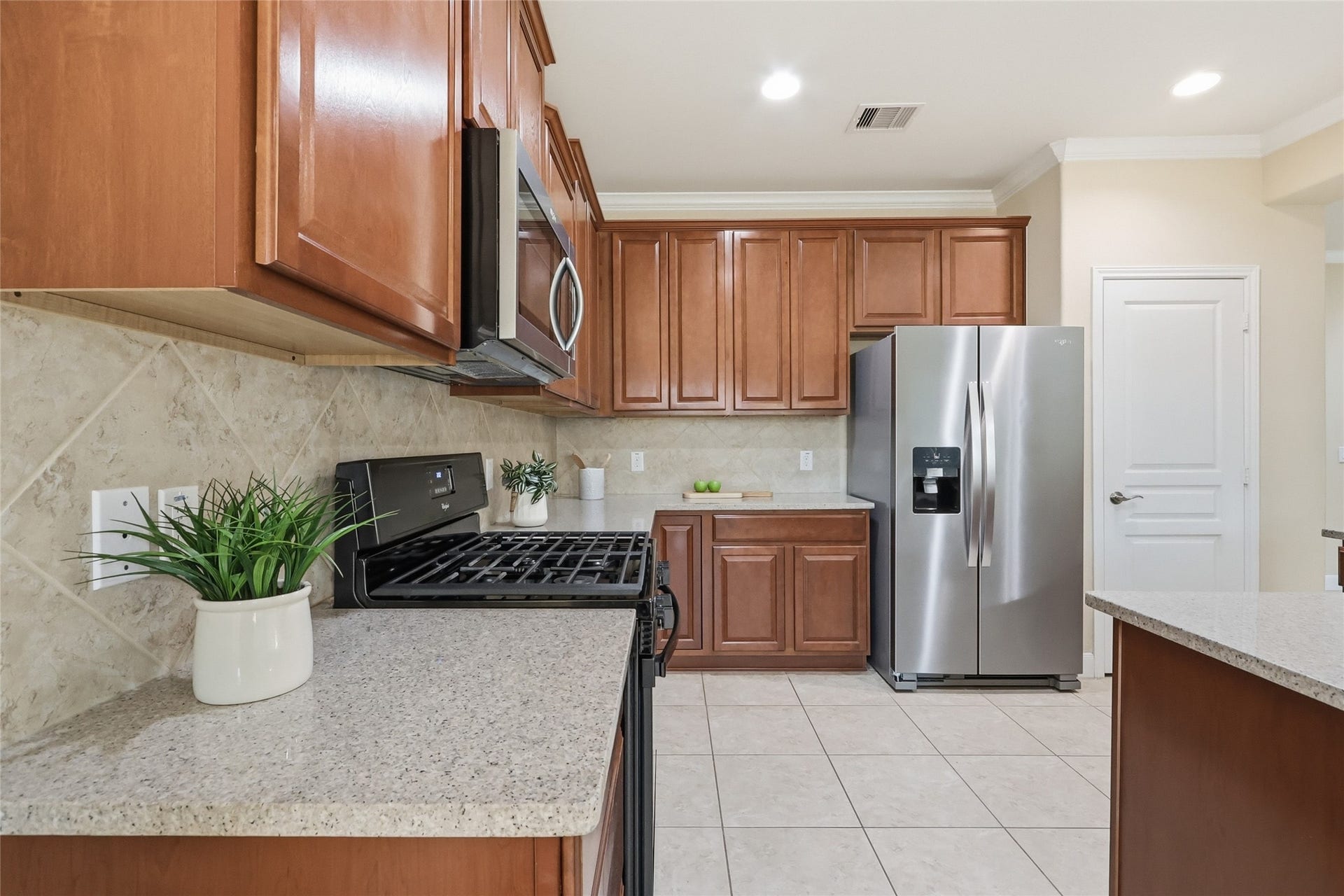 3263 Persimmon Grove, Richmond, TX 77469 View of the kitchen. Lots of stage space above and below the counters.