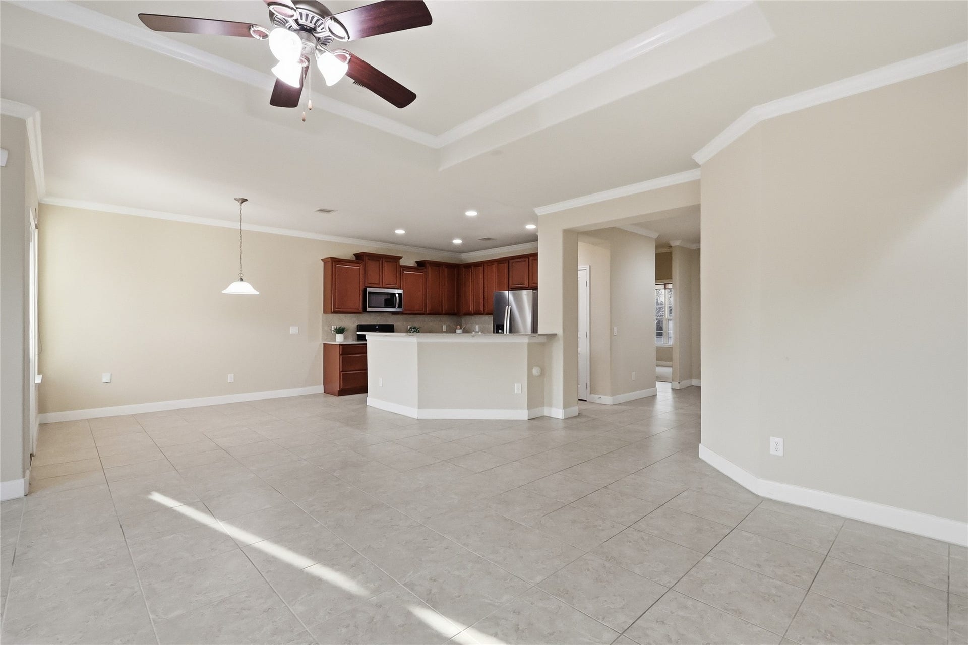 3263 Persimmon Grove, Richmond, TX 77469 living room. View from the back corner wall.