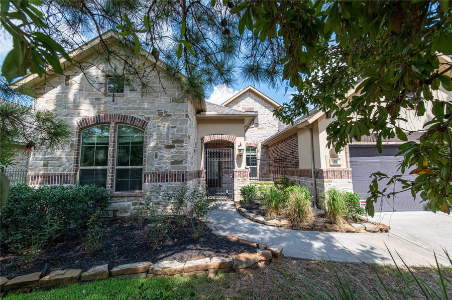 Property photo for 98 N Braided Branch Drive, Tomball, TX
