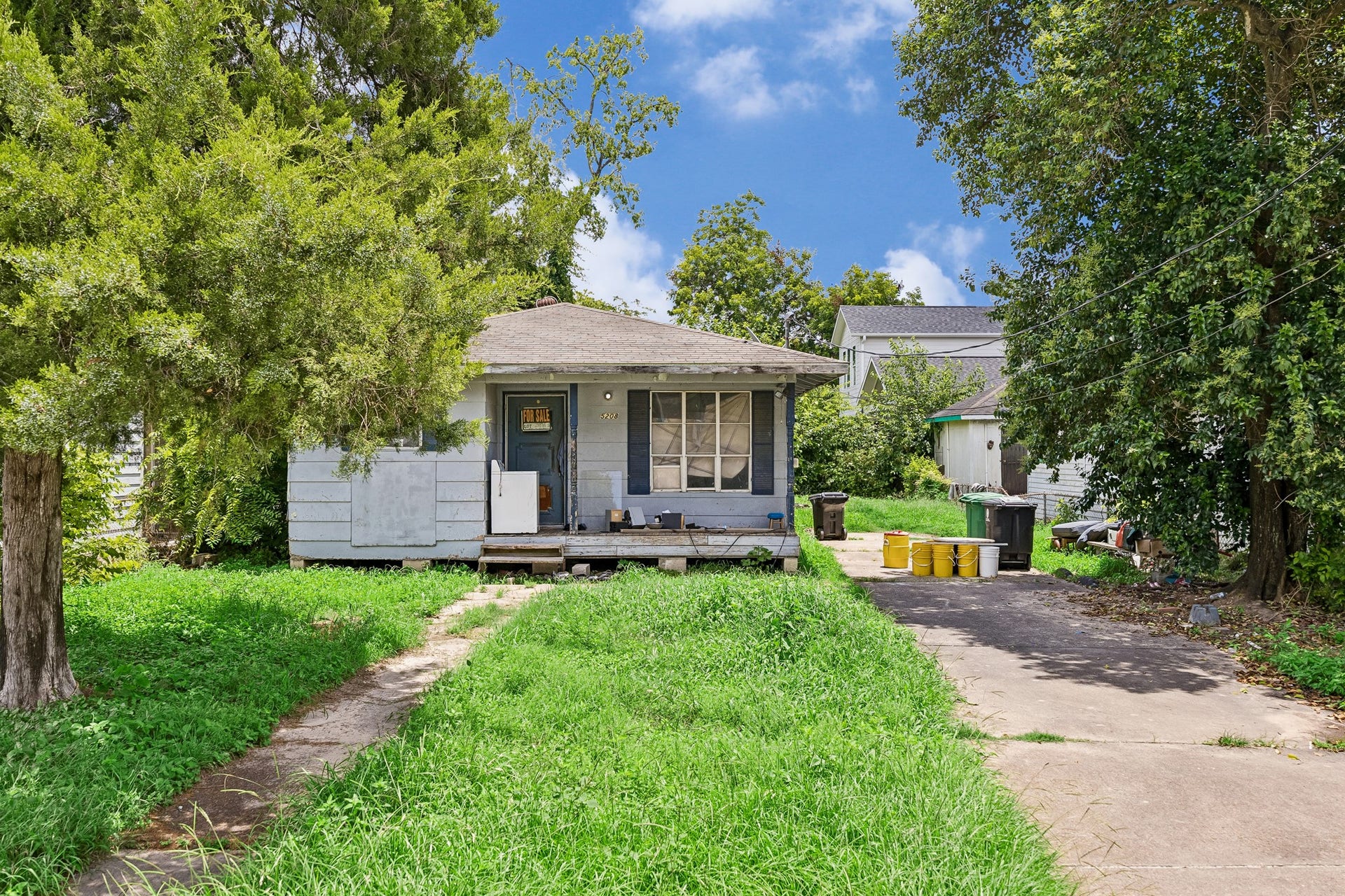 The property currently features a single-story teardown residence.