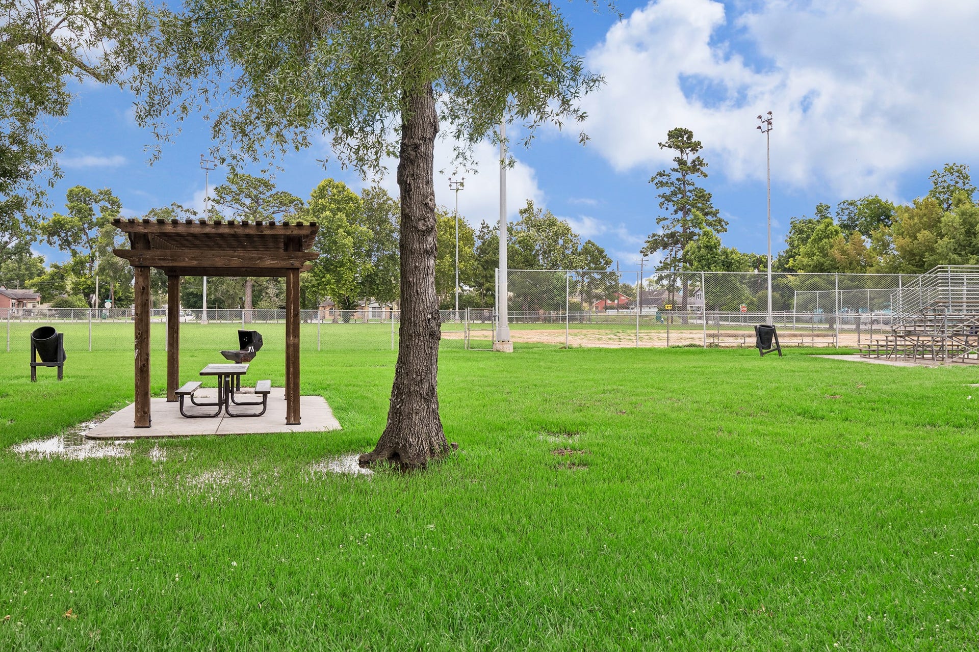 Beautiful open green spaces, walking paths, and recreational facilities enhance the neighborhood's appeal. Whether enjoying a morning walk, exercising outdoors, or spending time with family and friends, residents have convenient access to a variety of outdoor amenities.