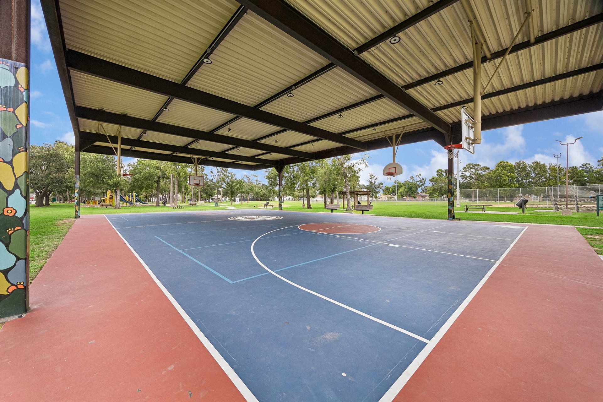 Just moments away, residents can enjoy a covered multi-purpose basketball pavilion that allows for year-round recreation, rain or shine. This community amenity offers a great space for sports, exercise, and neighborhood gatherings.