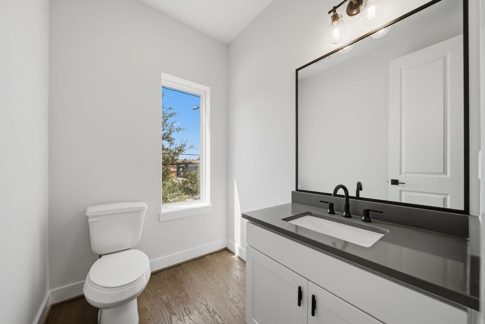 332 Eastwood Street, Houston, TX 77011 Half bath located on second floor for easy guest access.