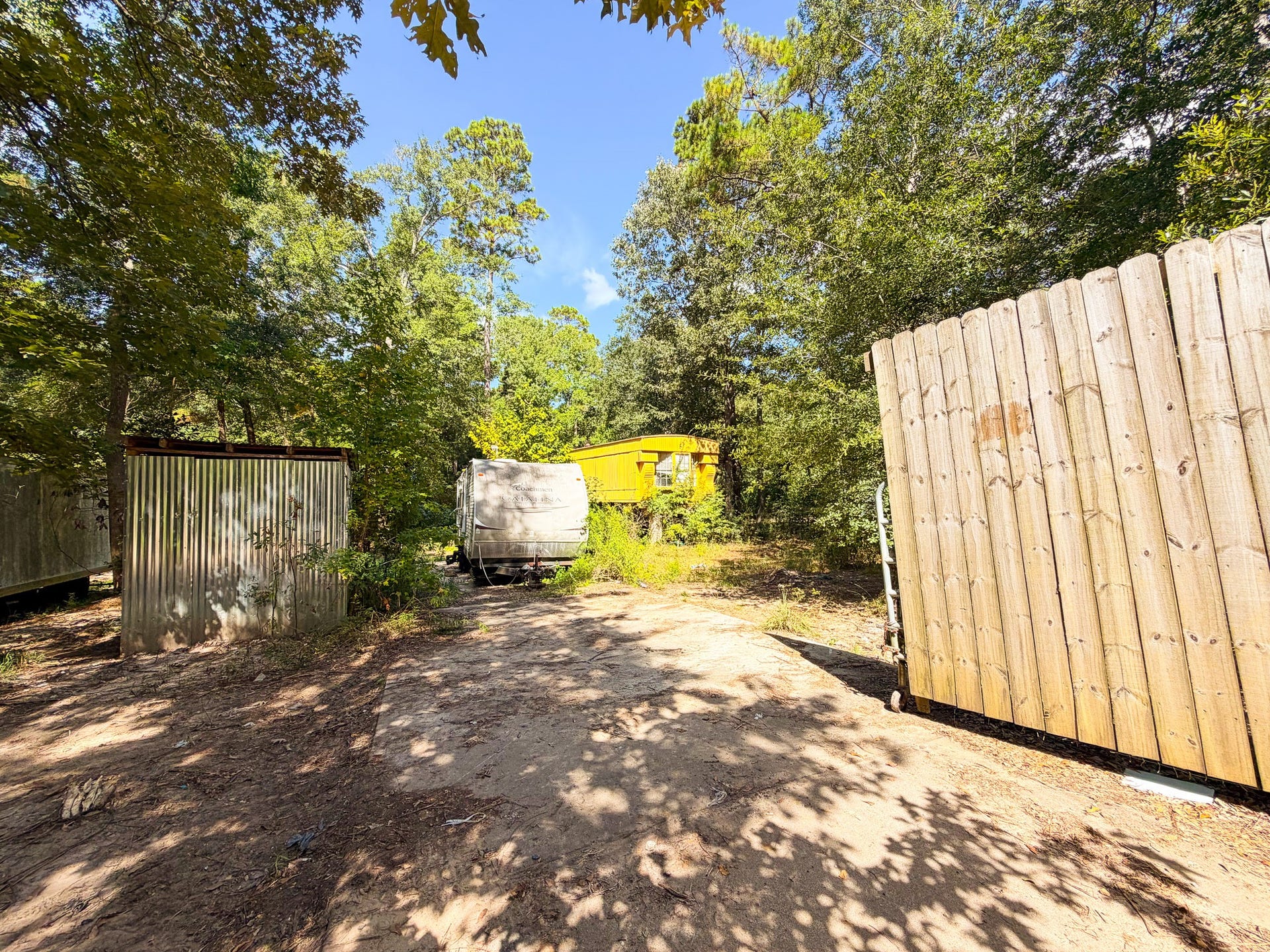 Enter through the rolling gate to your property