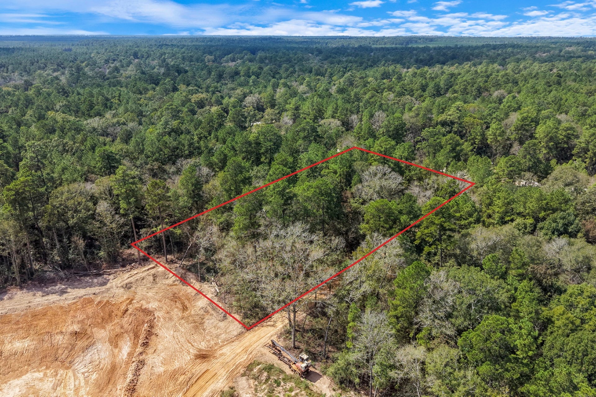 12109 Dawn Tree Lane, Willis, TX 77378 Tall trees create a natural privacy screen across this wooded lot. Boundary lines are approximate.