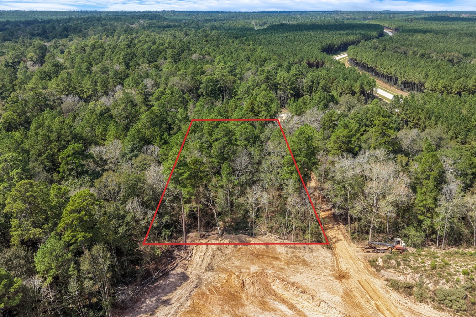 12109 Dawn Tree Lane, Willis, TX 77378 Sitting on higher ground with mature pines all around, and a list of approved builders with no deadline to start. Boundary lines are approximate.