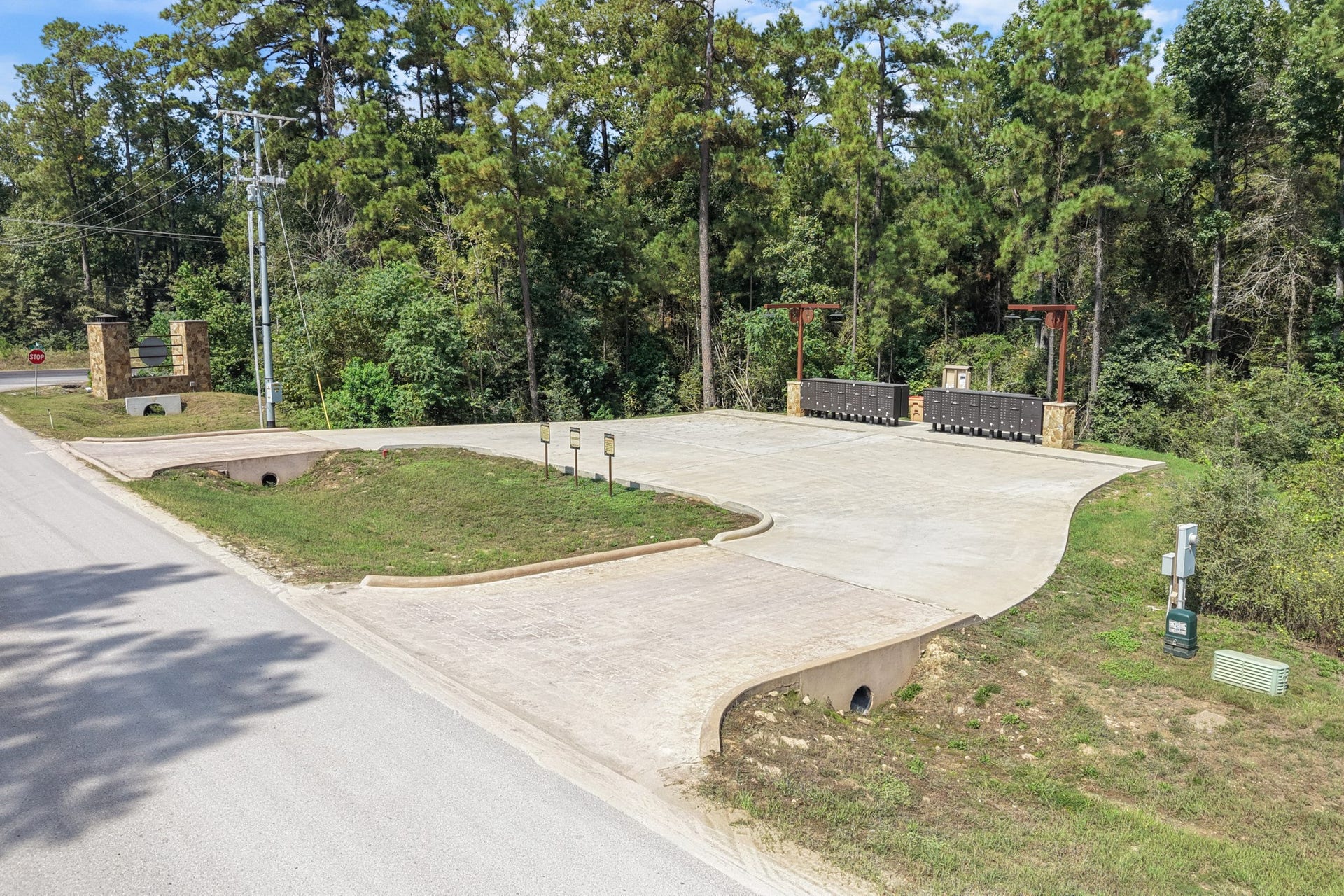12109 Dawn Tree Lane, Willis, TX 77378 A landscaped entry leads into a community with a fishing lake, pavilions, play areas and trails.