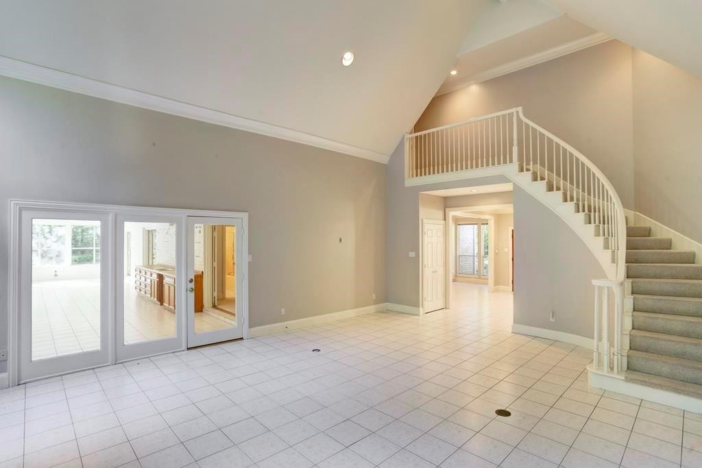 10210 Winding Wood Lane, Tomball, TX 77375 Living Room with beautiful staircase