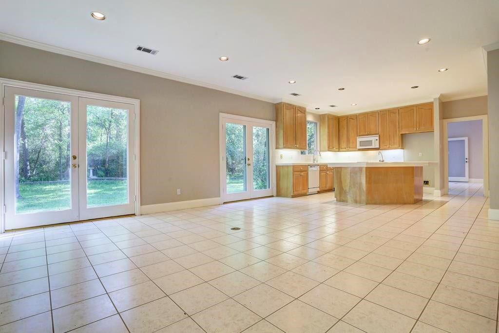 10210 Winding Wood Lane, Tomball, TX 77375 Kitchen open to family room