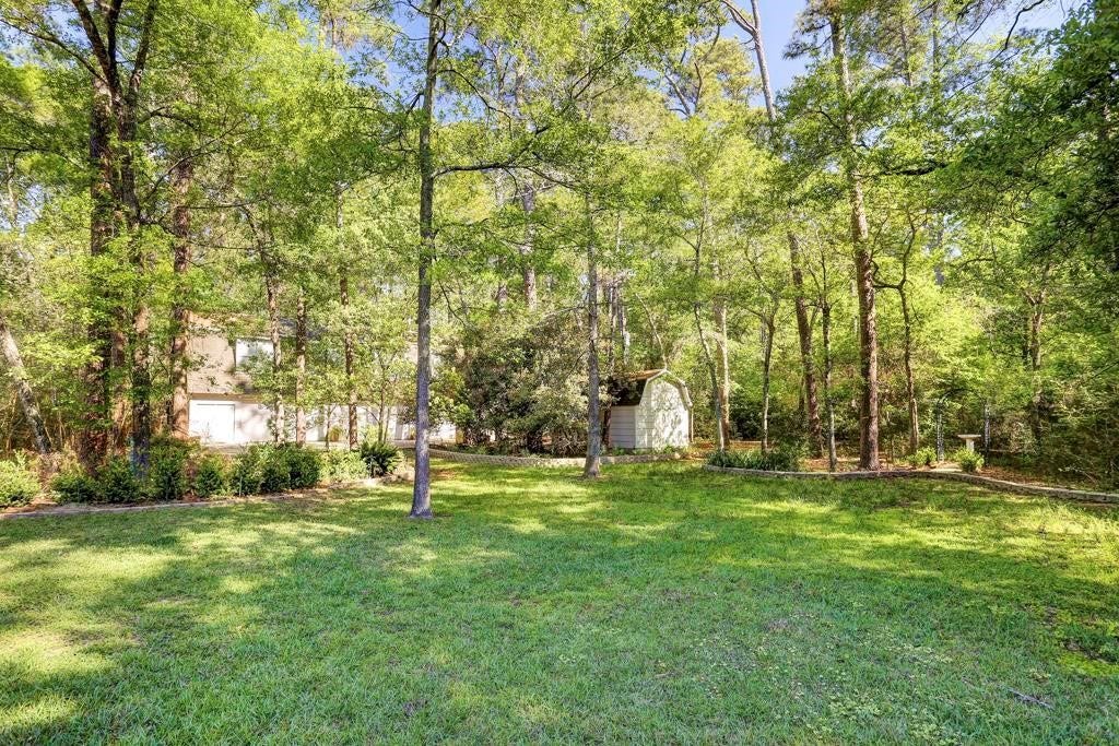 10210 Winding Wood Lane, Tomball, TX 77375 Beautiful lot view with pump house