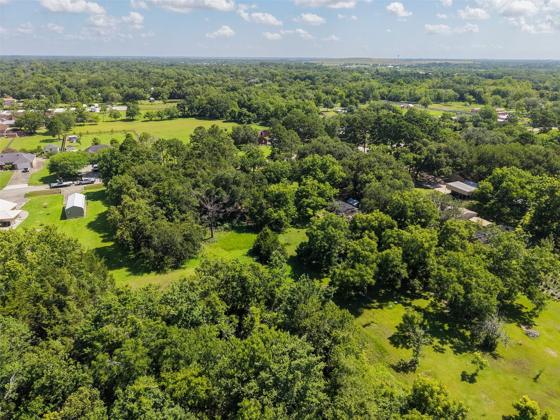 Established hardwoods create a naturally beautiful backdrop across the acreage, offering shade, privacy and character that would take decades to reproduce on a newly planted homesite. The generous dimensions provide an opportunity to work around desirable trees when designing future improvements. Combined with the open sections visible throughout the tract, the property offers an appealing balance between usable land and established natural beauty.