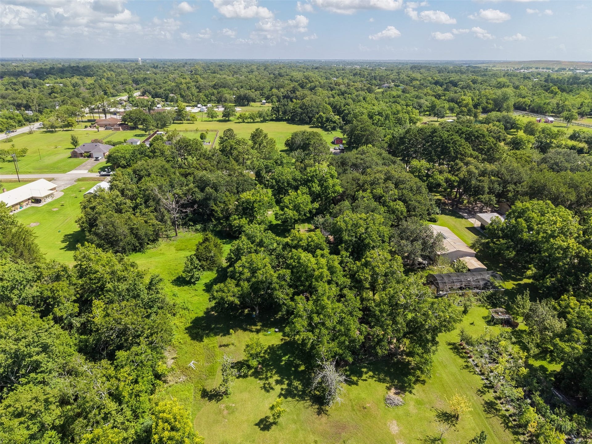 The surrounding acreage captures the relaxed, spacious character of Santa Fe while the property's location keeps local favorites within easy reach. Nearby FM 646 is home to Doreck's Meat Market, a longtime local butcher and grill, and Driftwood BBQ, offering Texas barbecuegiving future residents convenient local options beyond the larger Highway 6 corridor.