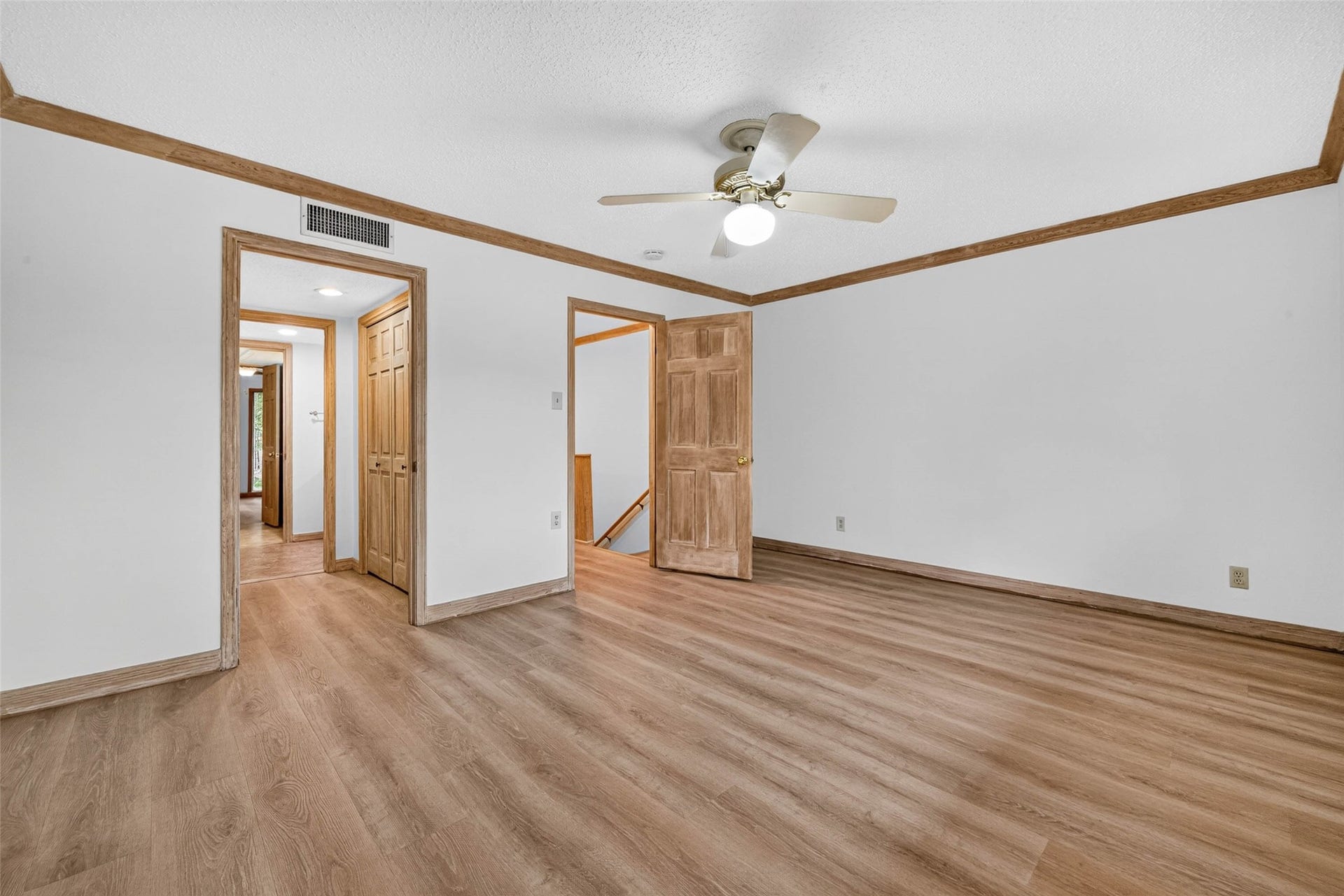 Spacious room with elegant wood trim