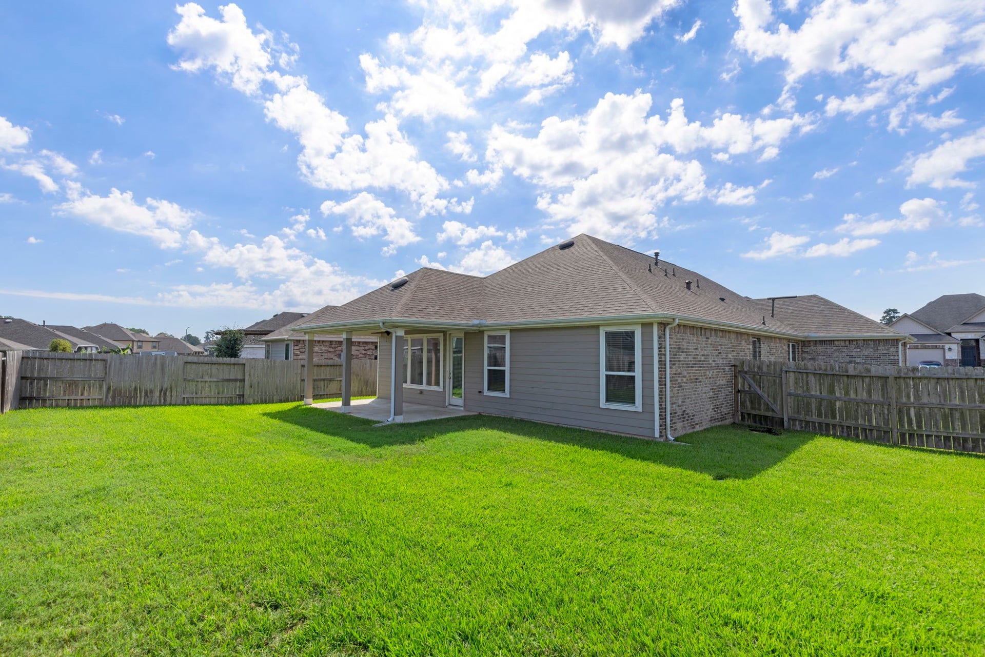 8731 Ute Creek Lane, Magnolia, TX 77354 Plenty of green space to play or entertain.