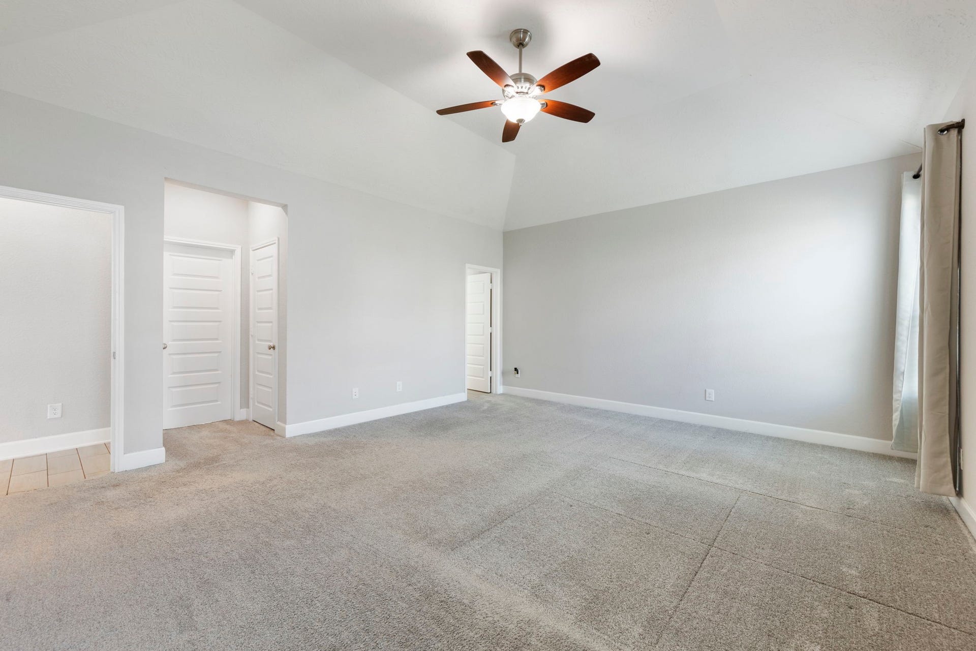 8731 Ute Creek Lane, Magnolia, TX 77354 Generous primary bedroom with direct access to the en-suite bath.