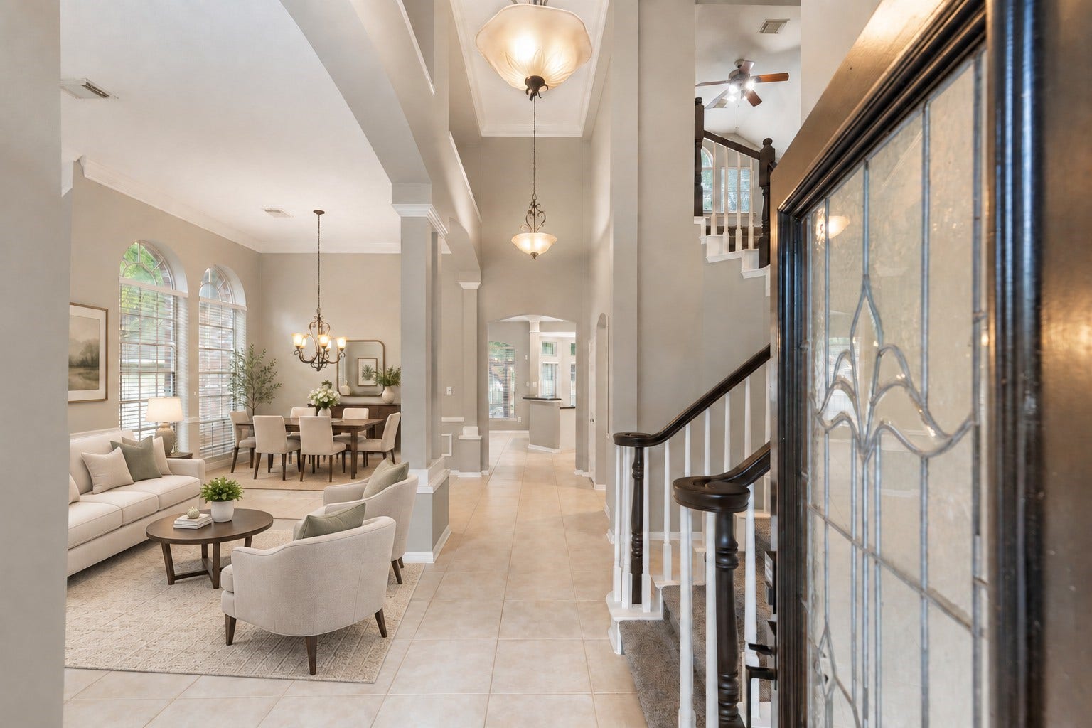 27 Stargazer Place, The Woodlands, TX 77381 VIRTUALLY STAGED - As you enter the home, you come into a spacious formal living and dining room with high ceilings.