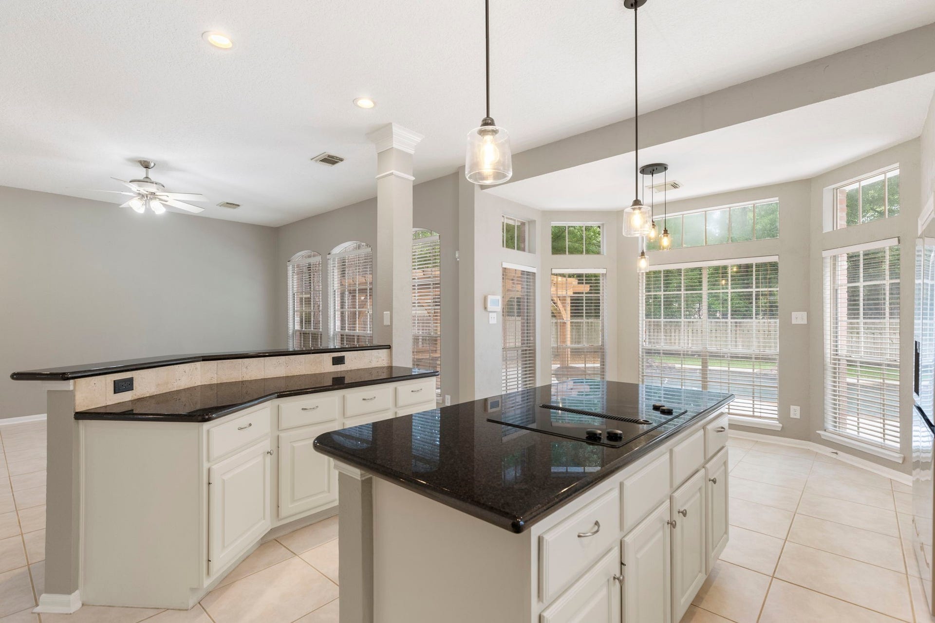 27 Stargazer Place, The Woodlands, TX 77381 There is another island which offers a breakfast or serving bar with even more storage.