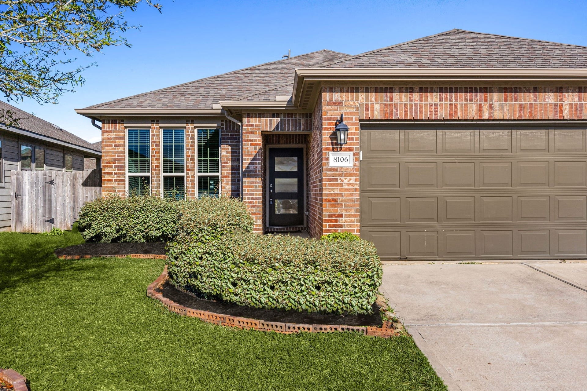 8106 Colony Chase Court, Richmond, TX 77407 Inviting front exterior featuring an attached two-car garage.
