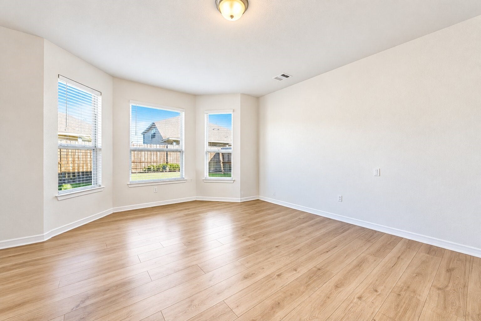 8106 Colony Chase Court, Richmond, TX 77407 Bedroom featuring large windows and beautiful natural light.