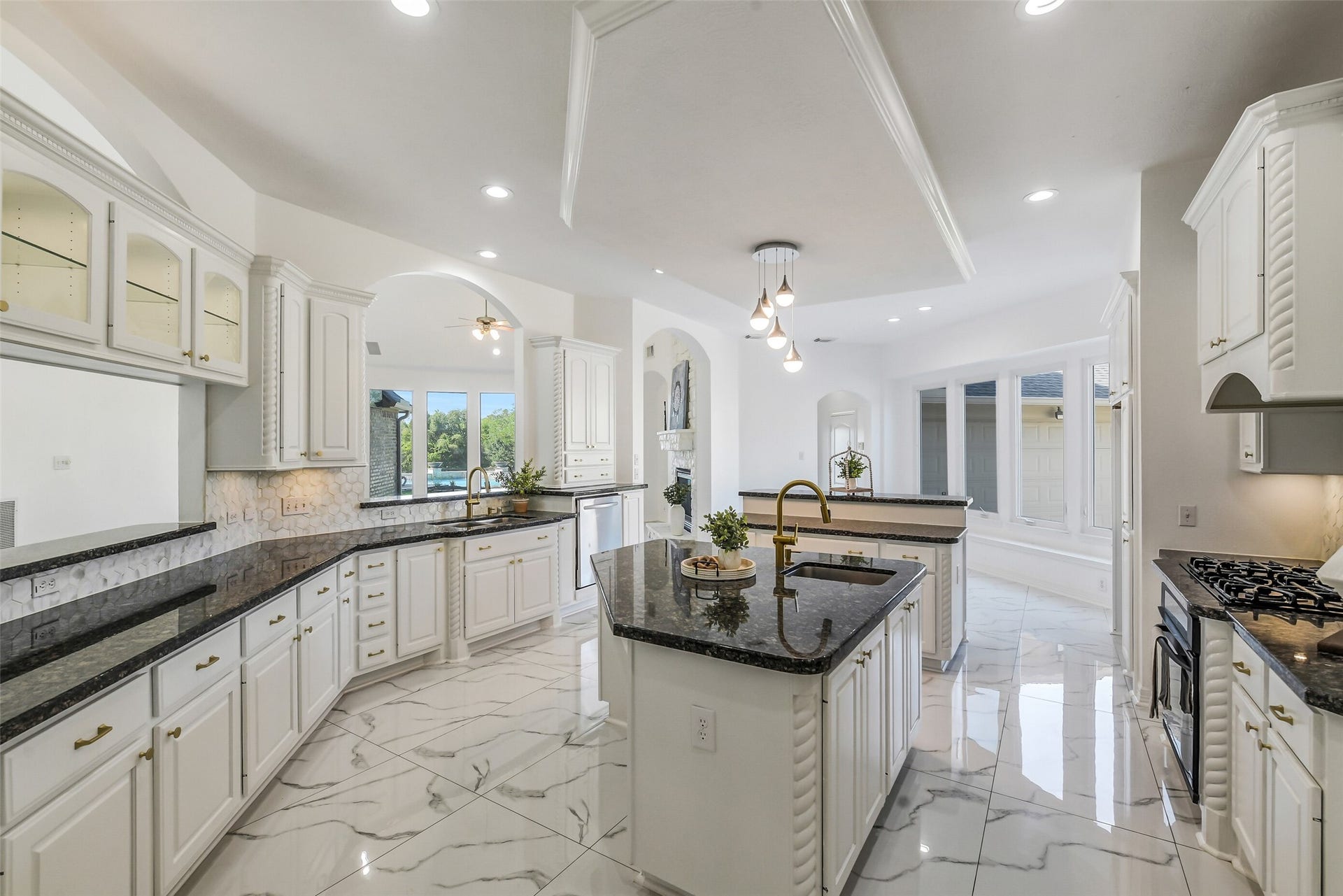 21018 W Farwood Terrace, Cypress, TX 77433 Marble floors with two islands and two ovens.