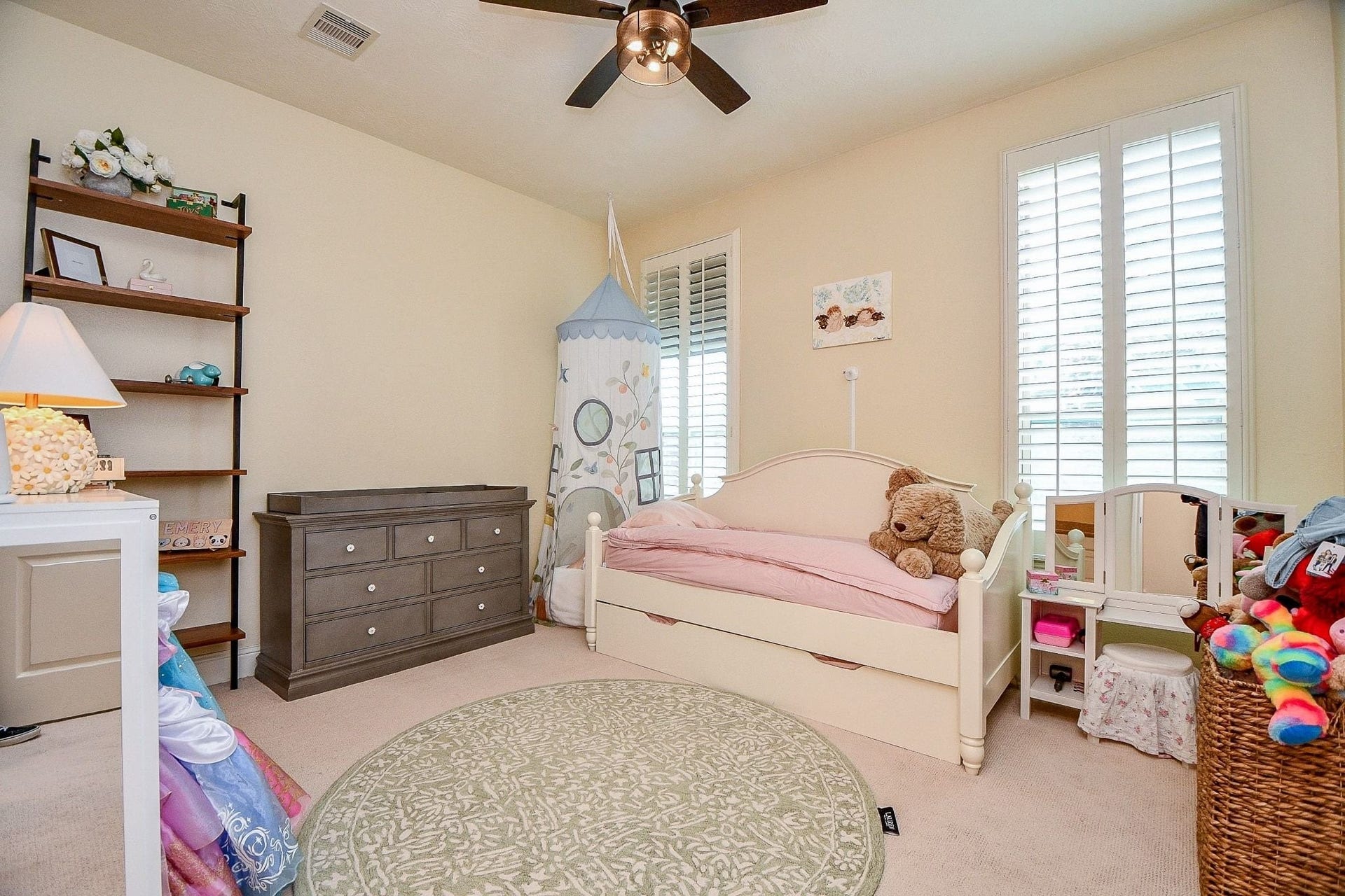 11410 Sardinia Drive, Richmond, TX 77406 This private guest suite is located downstairs at the opposite end of the home from the primary bedroom, offering added privacy. The suite features a private ensuite bathroom and plantation shutters.