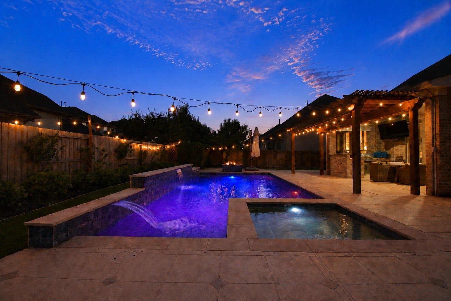 11410 Sardinia Drive, Richmond, TX 77406 Cant you imagine unwinding in the hot tub after a long day, roasting smores over the gas firepit, or grilling a delicious meal for friends and family in the outdoor kitchen? This backyard is truly designed for relaxing, entertaining, and making lasting memories.