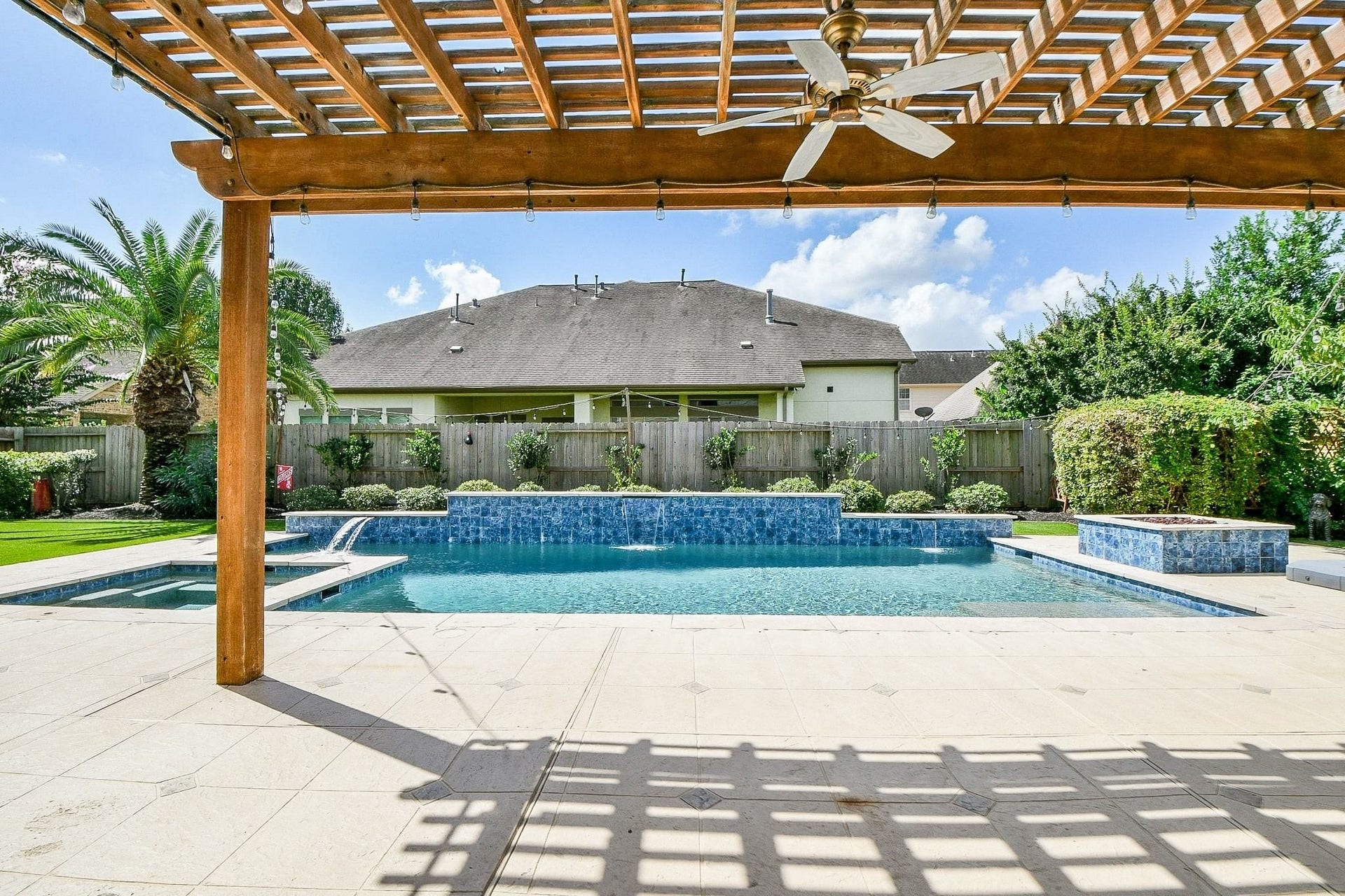11410 Sardinia Drive, Richmond, TX 77406 Wow! This gorgeous oversized pool creates the ultimate backyard retreat. Beautiful blue tilework and a stunning white decorative surround add an elegant touch, while the expansive cool-decking around the pool allows you to comfortably enjoy the space without worrying about hot concrete underfoot. Its the perfect setting for relaxing, entertaining, and enjoying the outdoors.