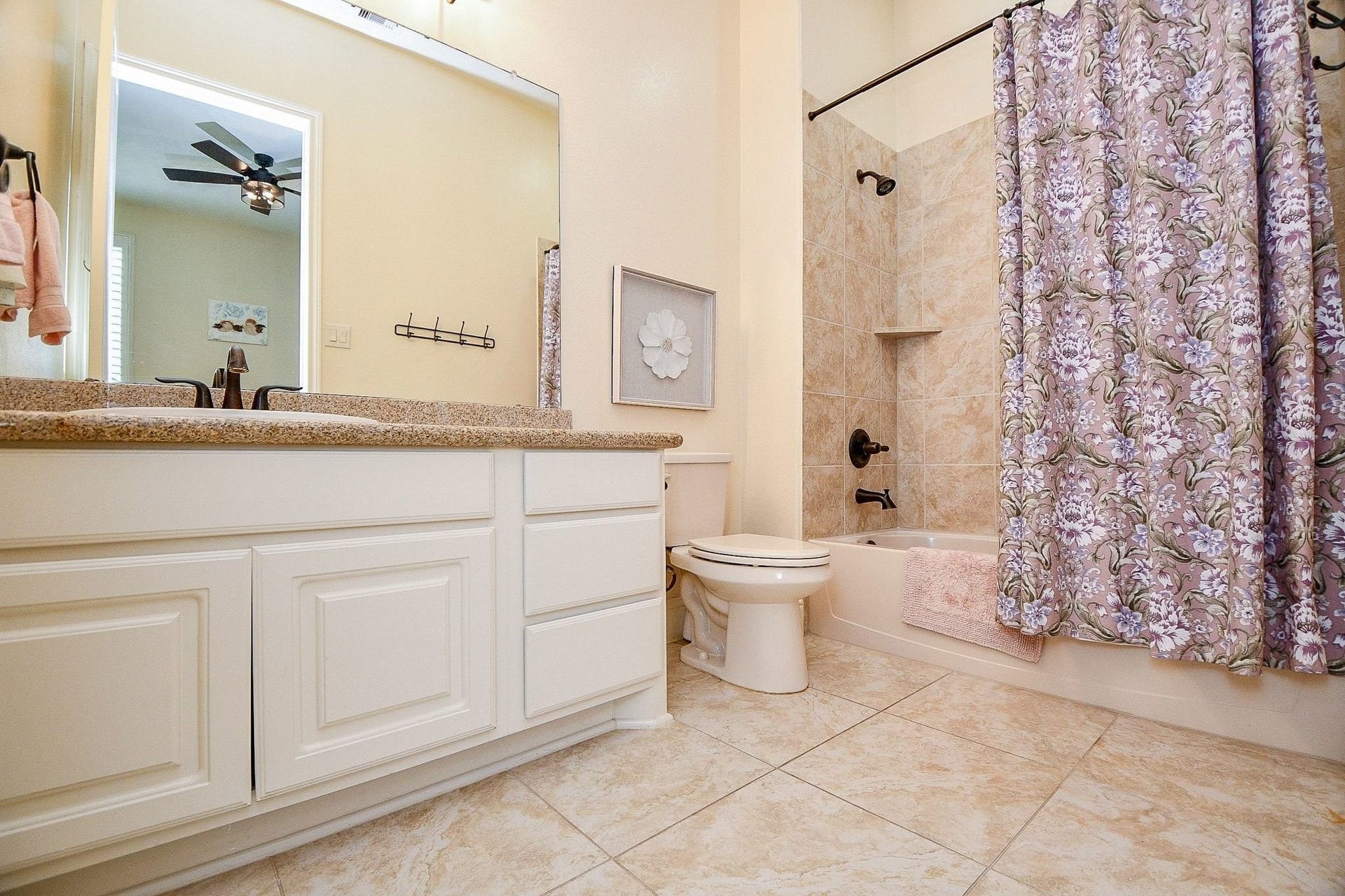 11410 Sardinia Drive, Richmond, TX 77406 A look inside the ensuite bathroom, offering a bright, clean, and spacious retreat designed to provide comfort and privacy for visiting guests.