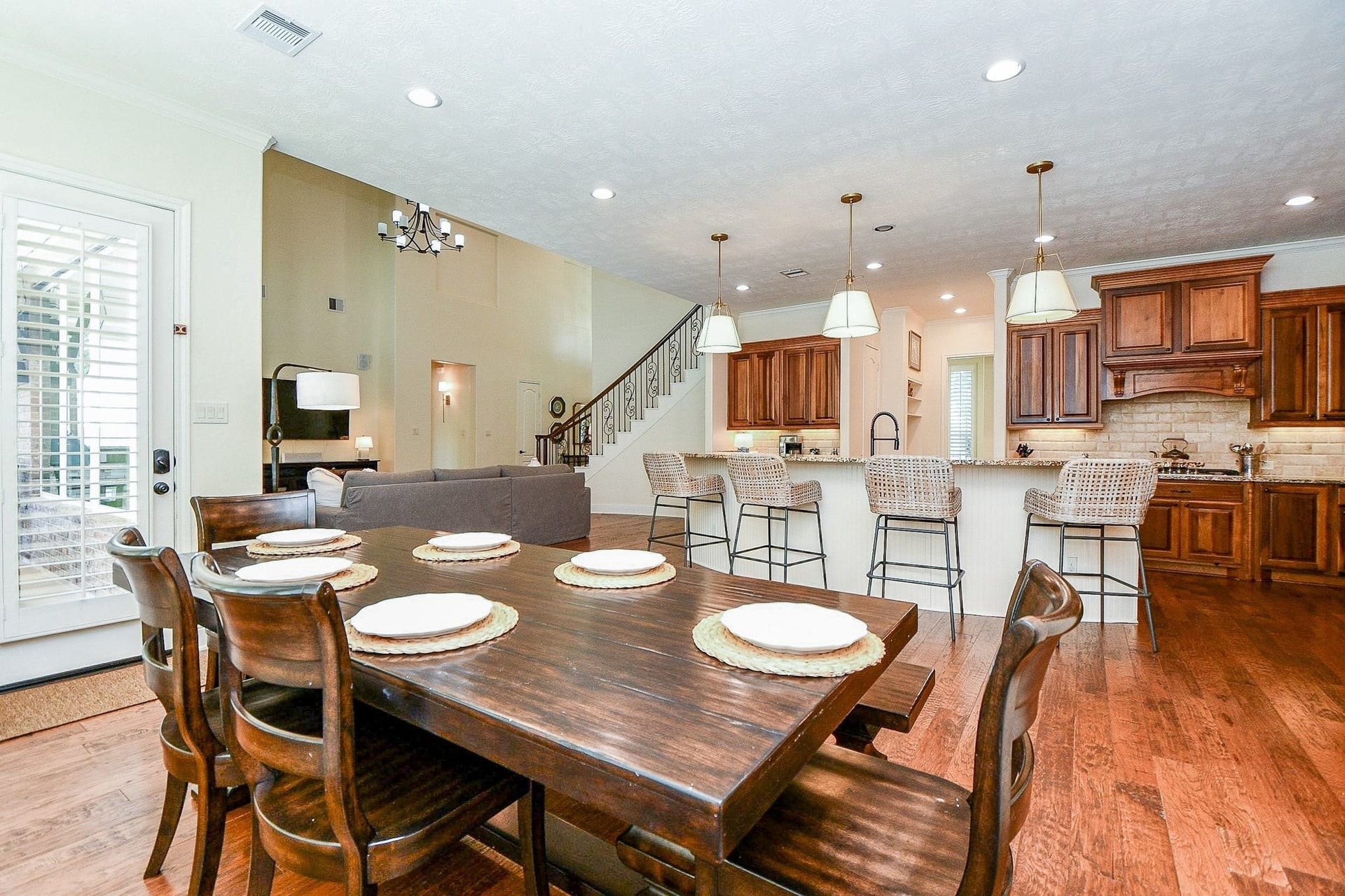 11410 Sardinia Drive, Richmond, TX 77406 Another view highlights the seamless open-concept design, keeping you connected to the heart of the home while enjoying meals with family and friends. This inviting space is truly designed for effortless entertaining and memorable gatherings.