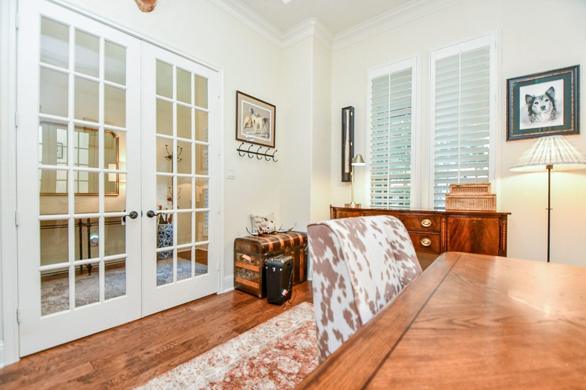 11410 Sardinia Drive, Richmond, TX 77406 Natural light fills the space, while elegant glass French doors create a sense of connection to the rest of the home while providing a quiet, private workspace.