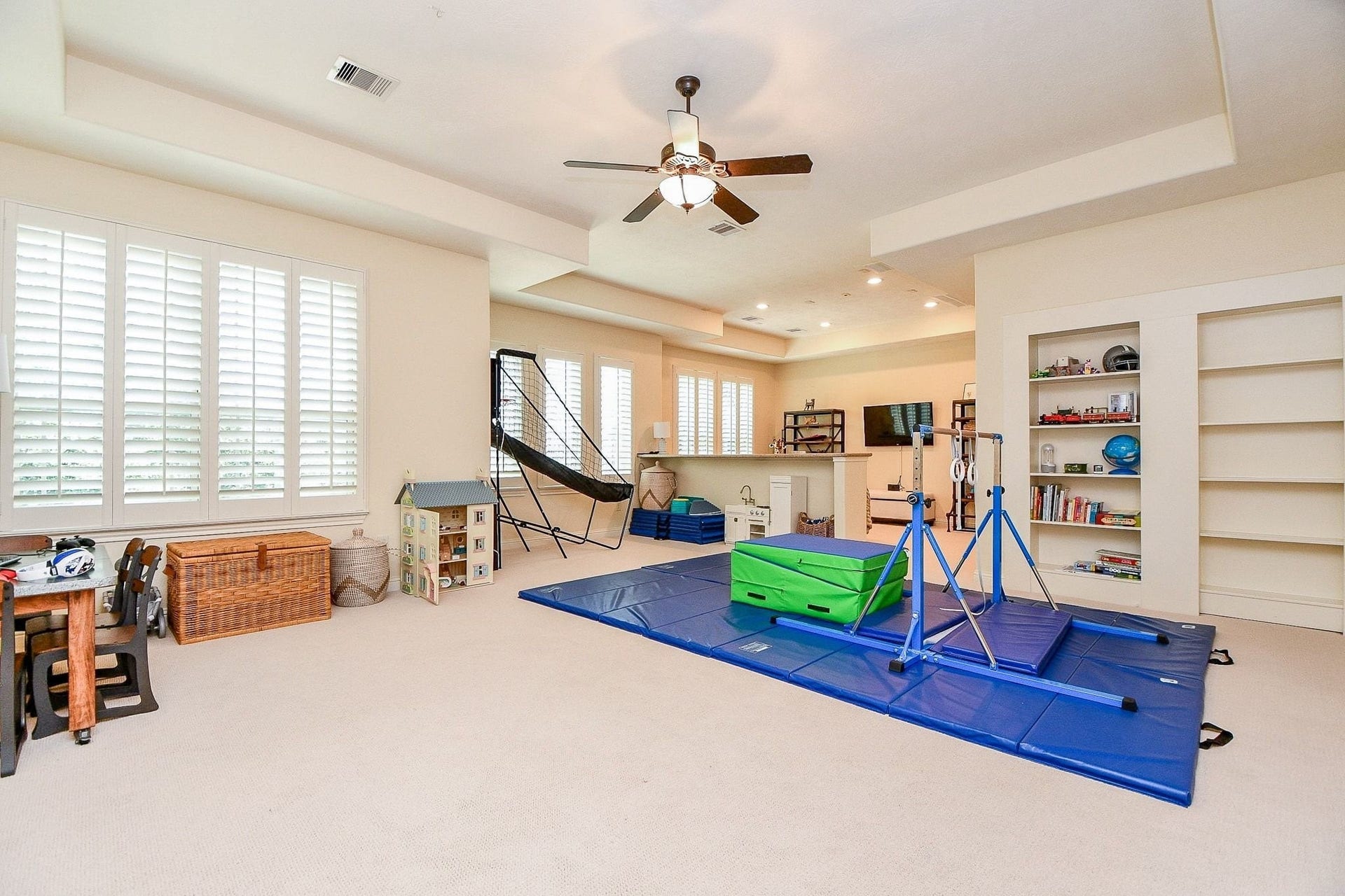 11410 Sardinia Drive, Richmond, TX 77406 As you ascend the stairs, youre greeted by a massive game room thoughtfully divided into two distinct areas, offering endless possibilities for entertaining, relaxing, or creating the perfect space to suit your needs.