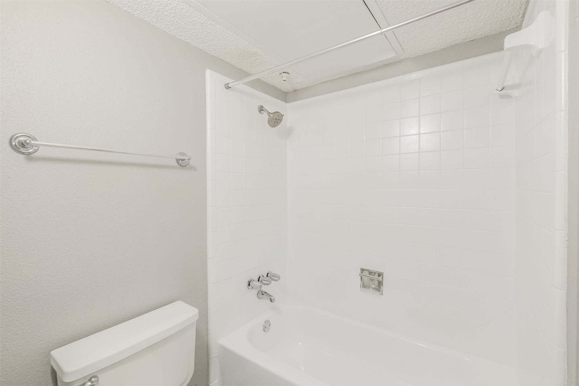 3100 Jeanetta Street, #1204, Houston, TX 77063 Updated bathroom with granite countertop, conveniently accessible for guests!