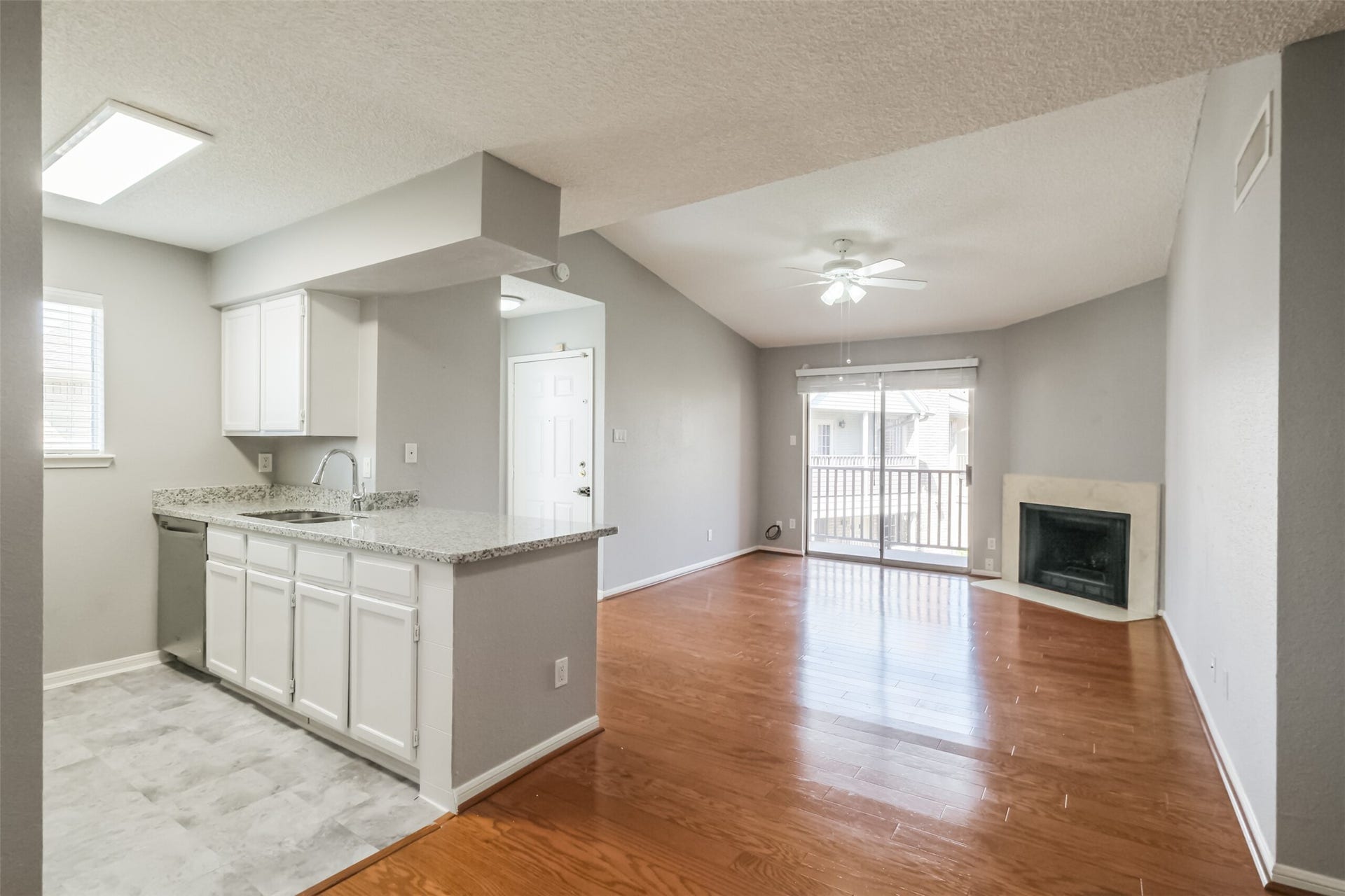 3100 Jeanetta Street, #1204, Houston, TX 77063 Open view of the living room from the dining area!